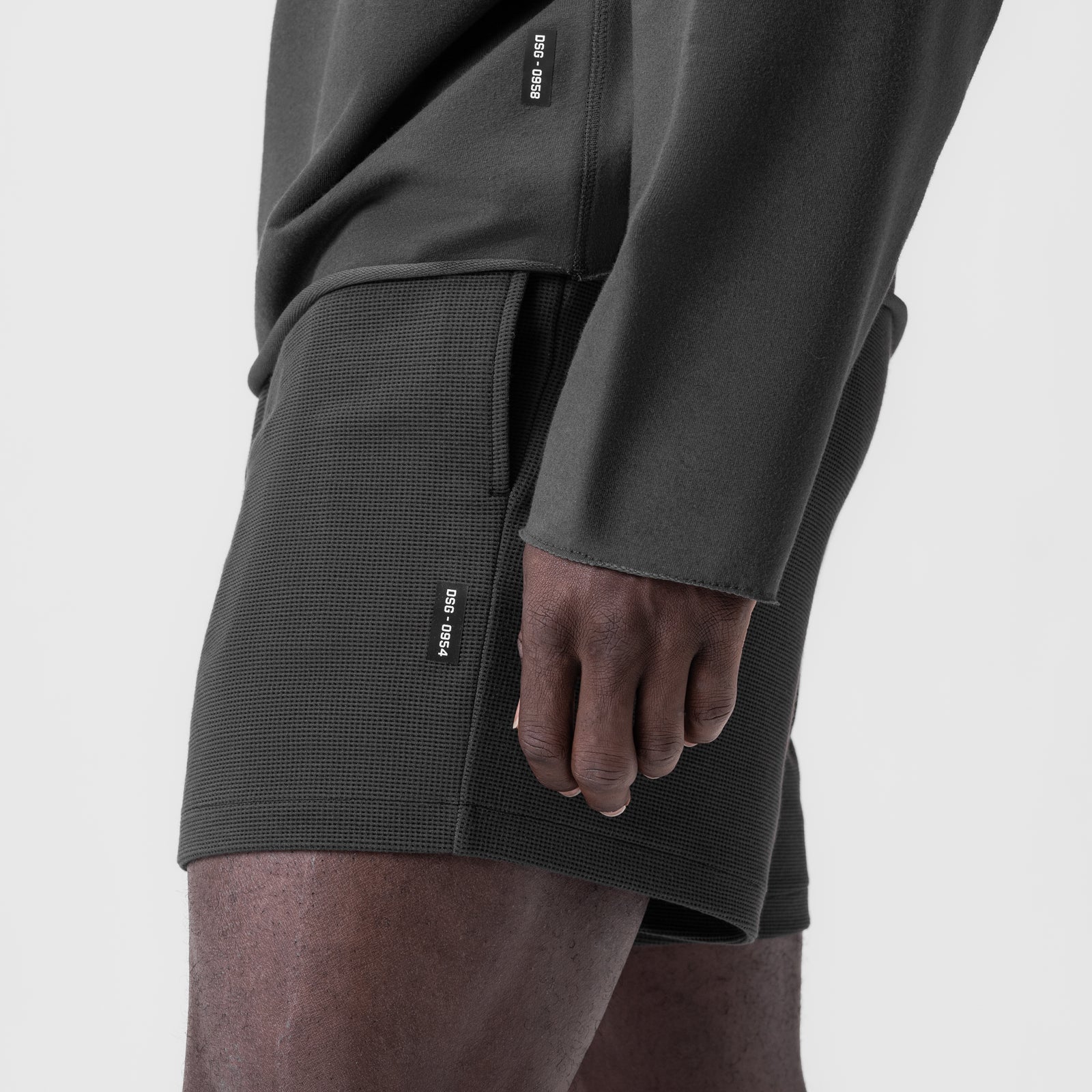 Waffle knit sweat short in space grey, worn by model showing side detail and fit