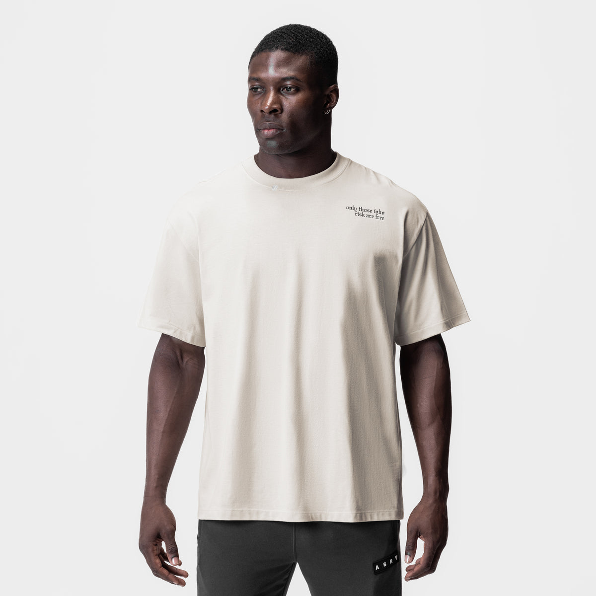 Tech Essential Relaxed Tee in stone, worn by model, front view