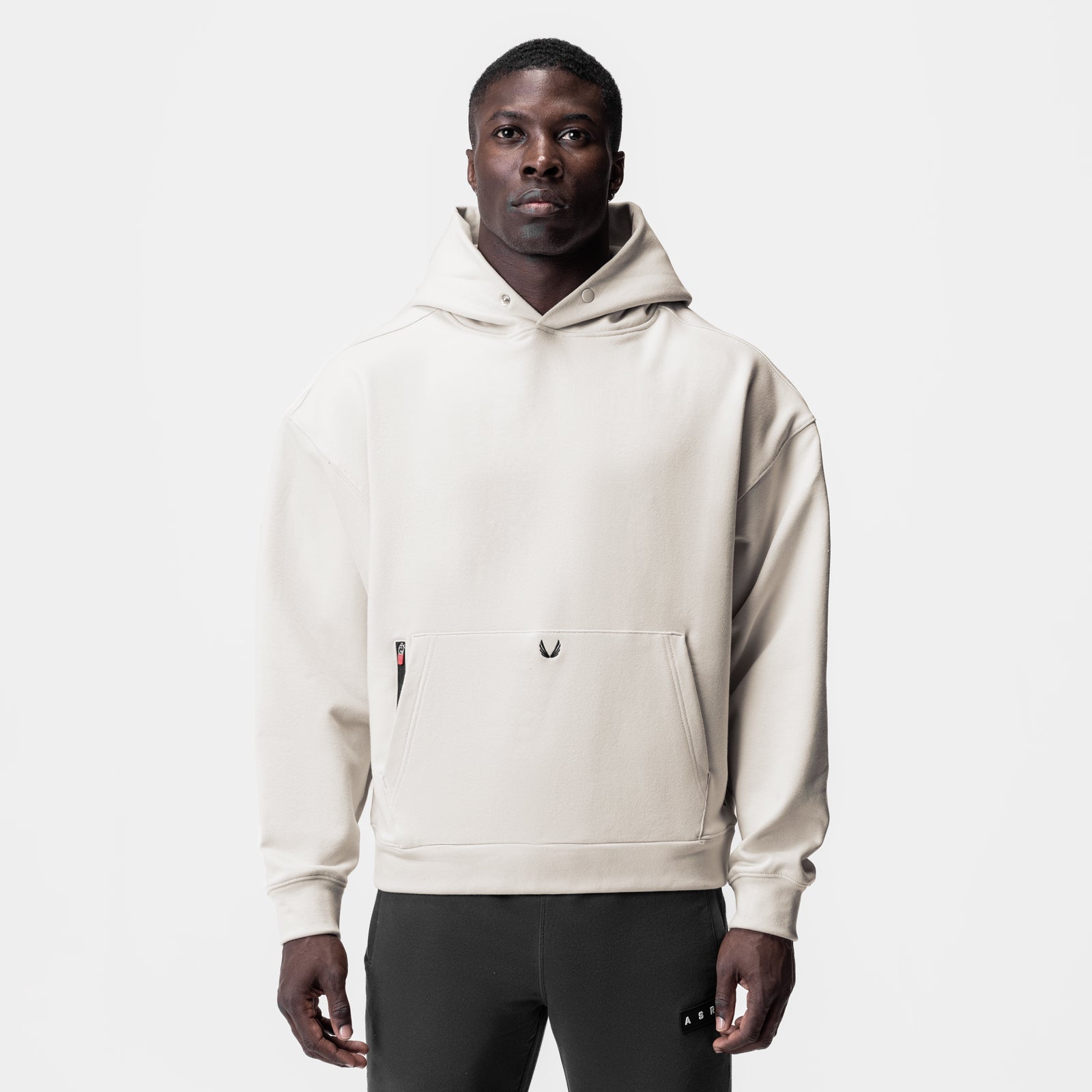 Tech-Terry Zip Pocket Hoodie in Stone worn by model, front view