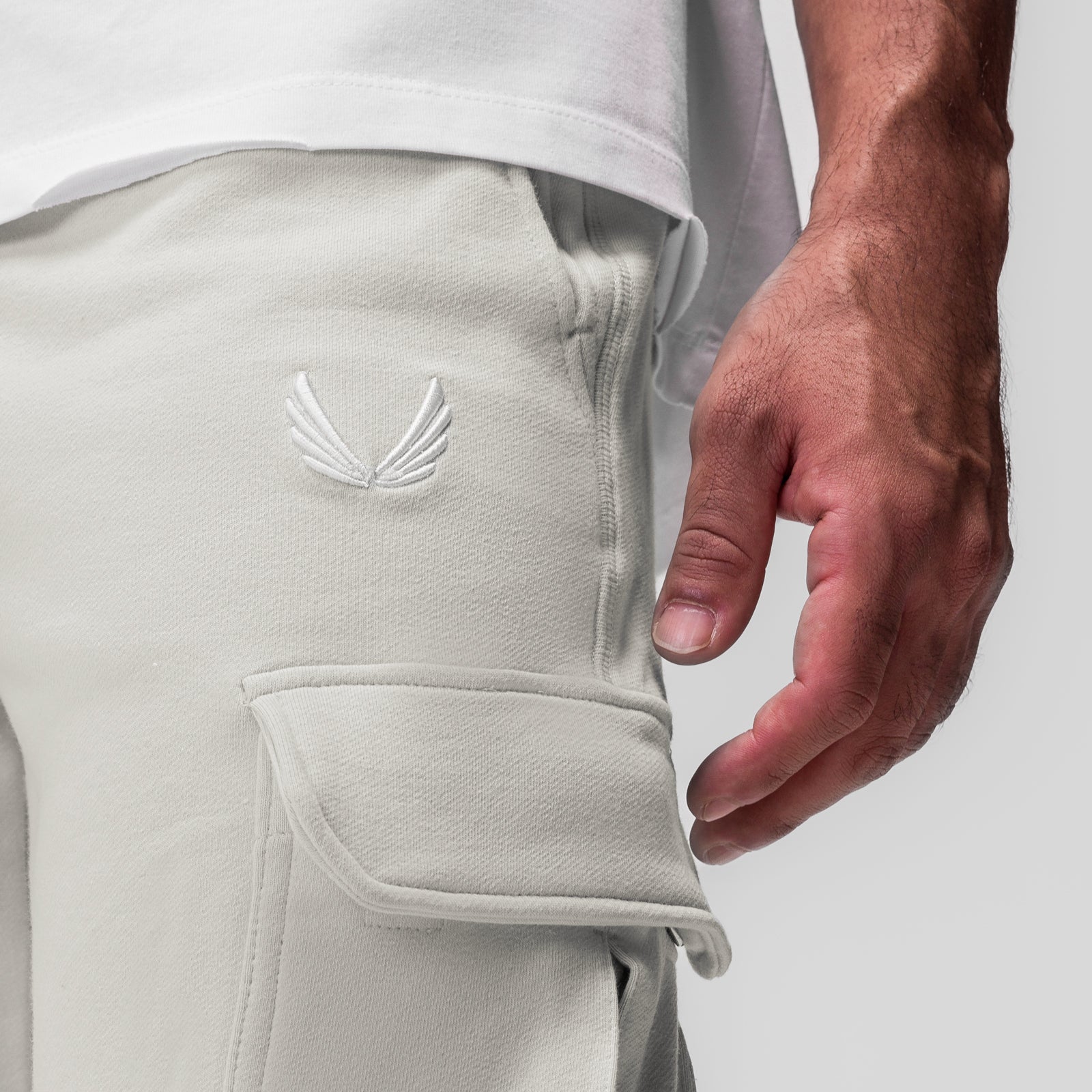 Tech-Terry Cargo High Rib Jogger in stone, worn by model showing cargo pocket detail