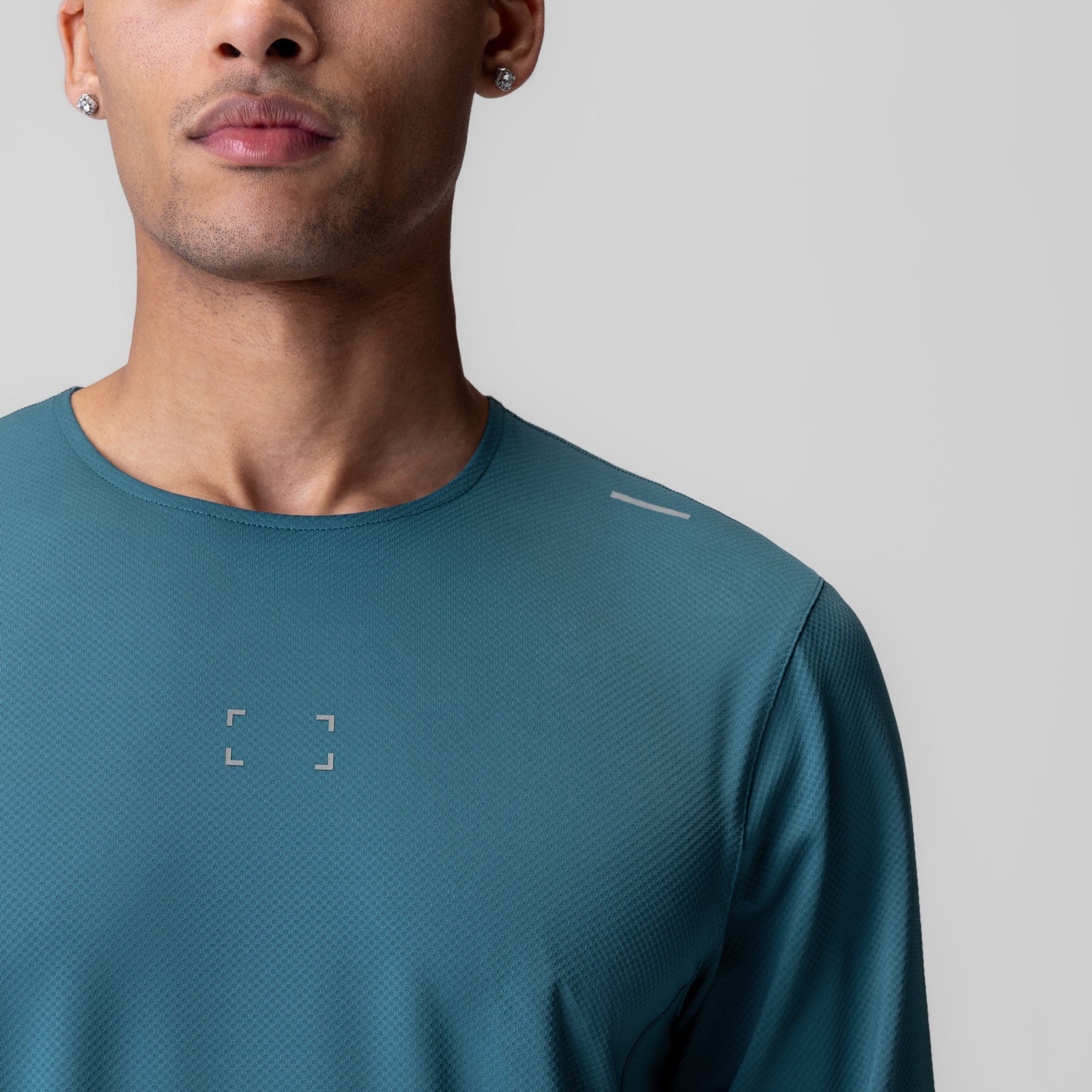 AeroSilver Training Long Sleeve in teal, worn by model, front view