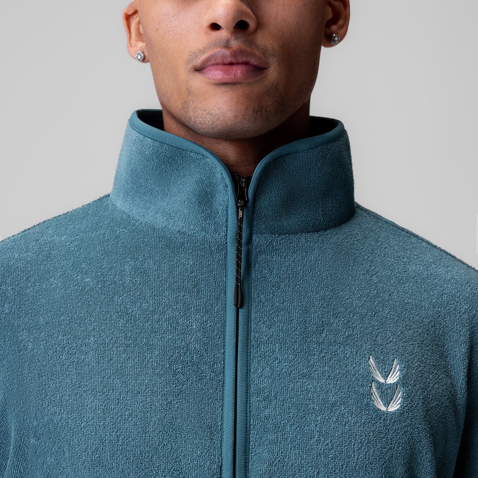 Towel Terry Quarter Zip Oversized Tee in storm blue, worn by model, front view