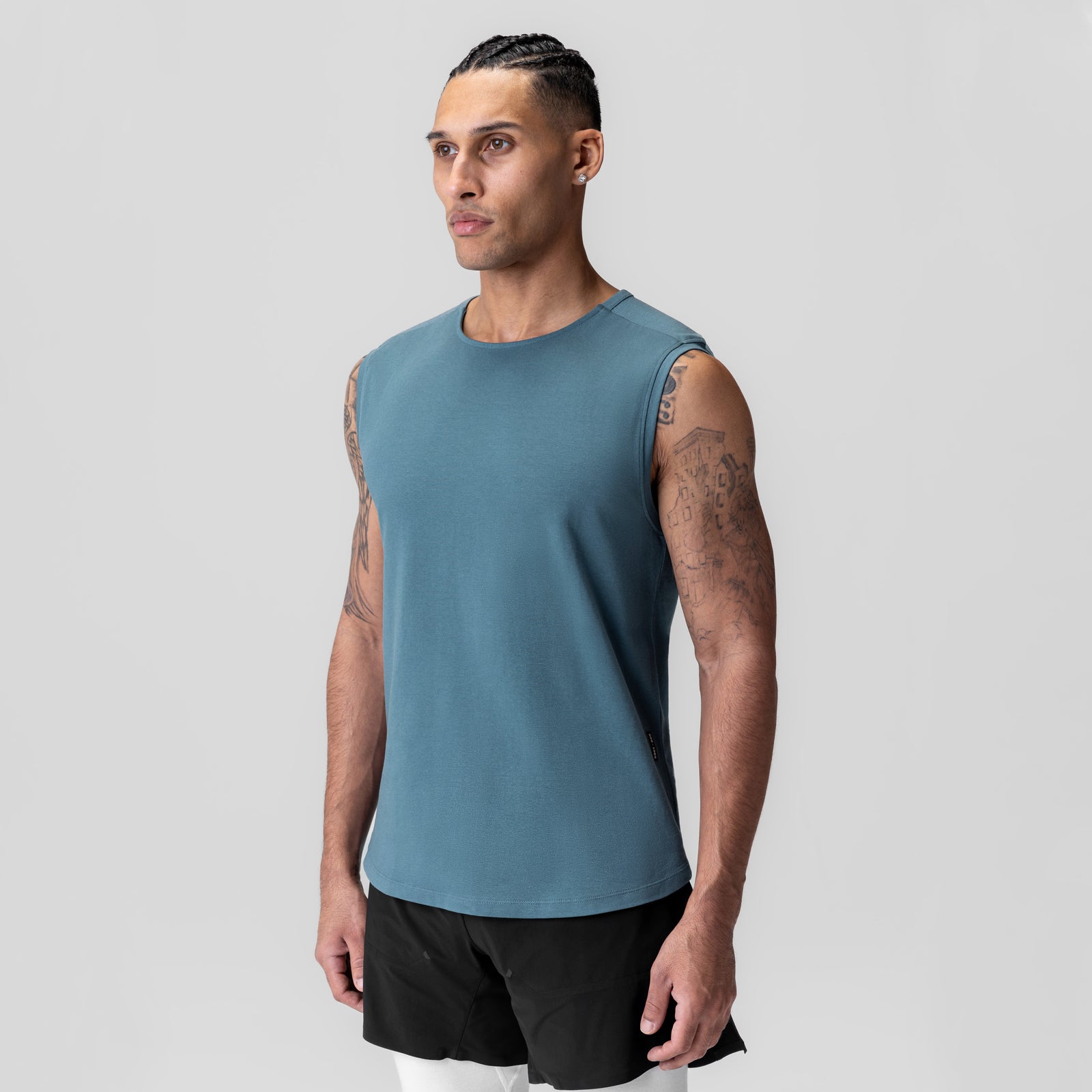 Creora® Cotton Modal Cutoff Tank in storm blue, worn by model with hands at sides