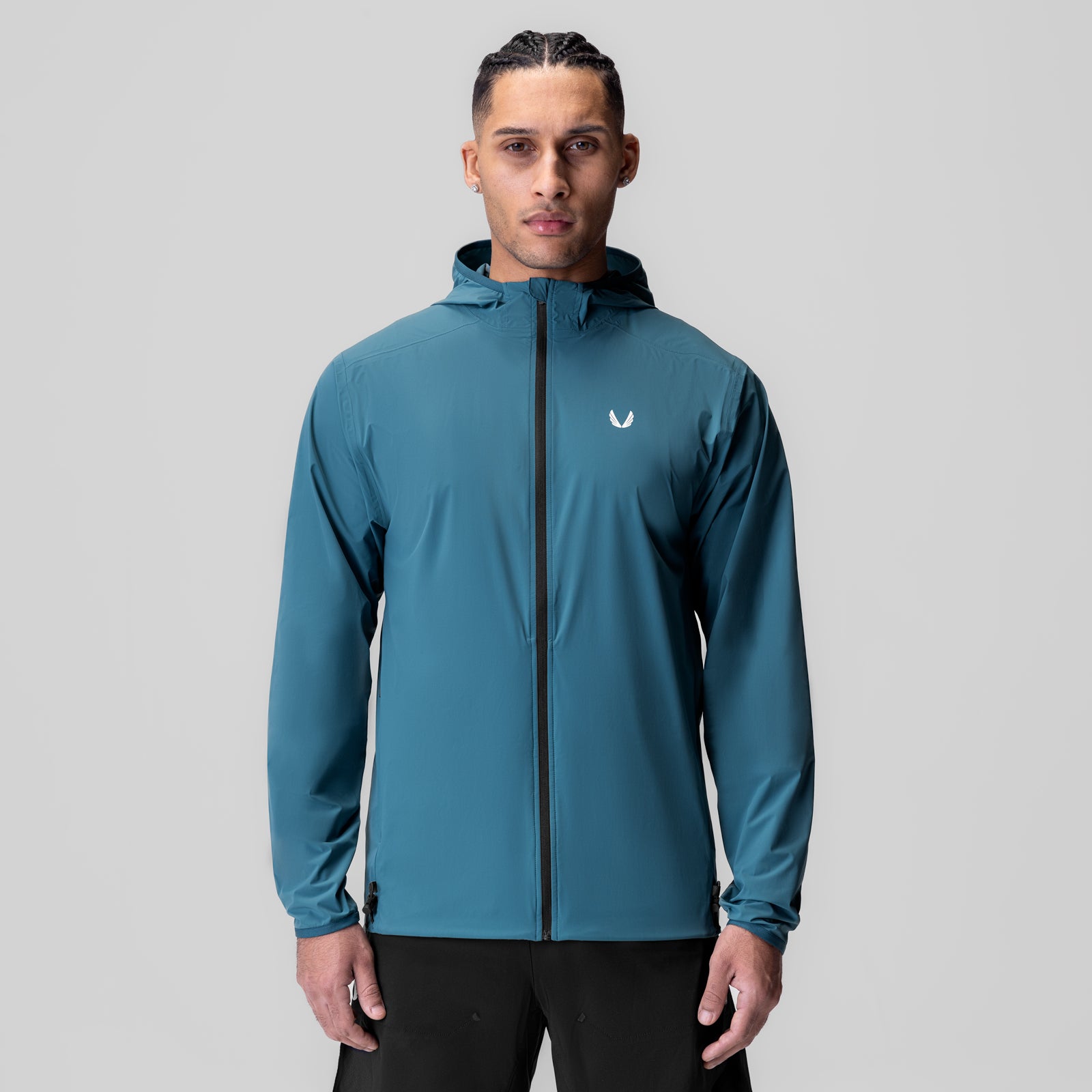 Aerotex Lightweight Windbreaker in storm blue, worn by model facing camera