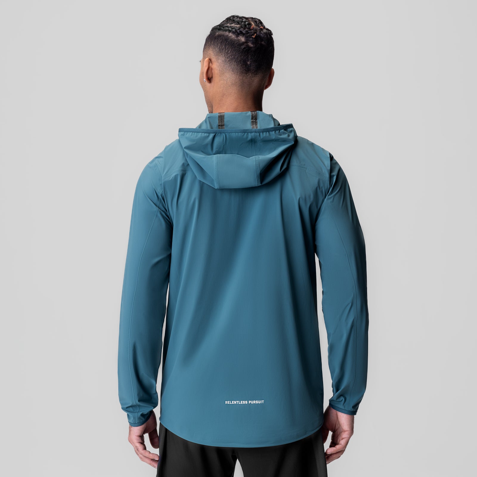 Aerotex Lightweight Windbreaker in storm blue, back view on model