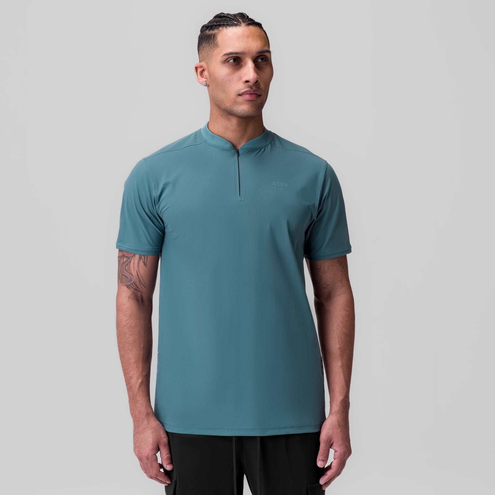 Tetra-Lite Ice Zip Tee in storm blue, worn by model, front view