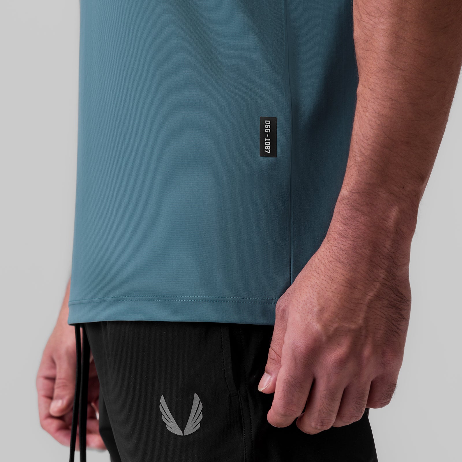 1087. Tetra-Lite® Ice Zip Tee - Storm – ASRV