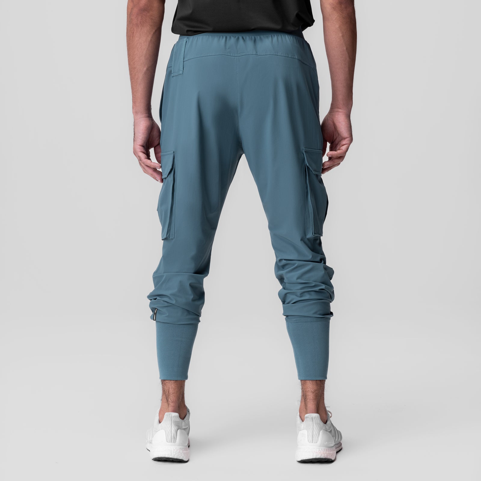 Tetra-Lite Ice Cargo High Rib Jogger in Storm blue, back view on model