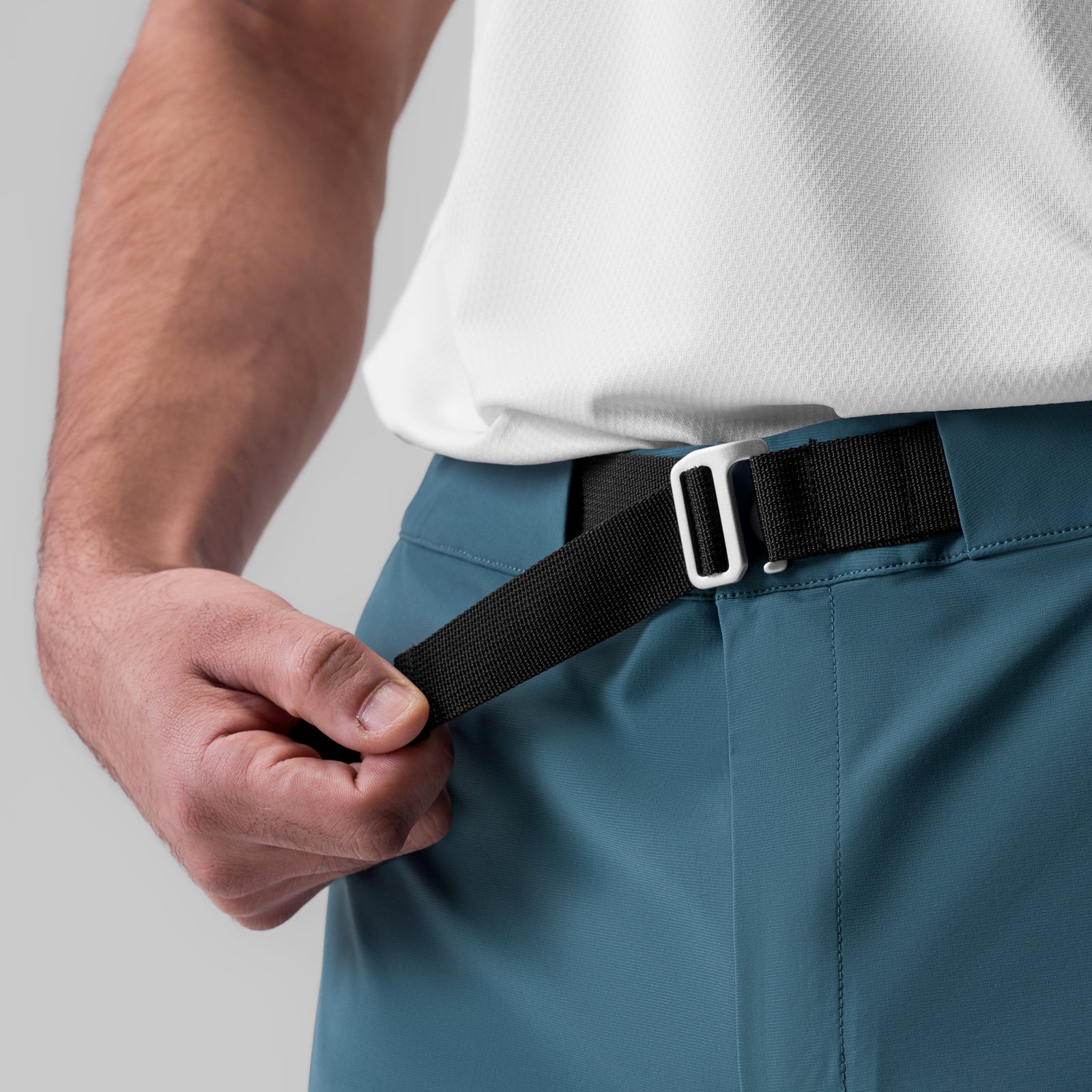 Tetra-Lite® Field Pant in storm blue being worn with black belt, close-up detail shot