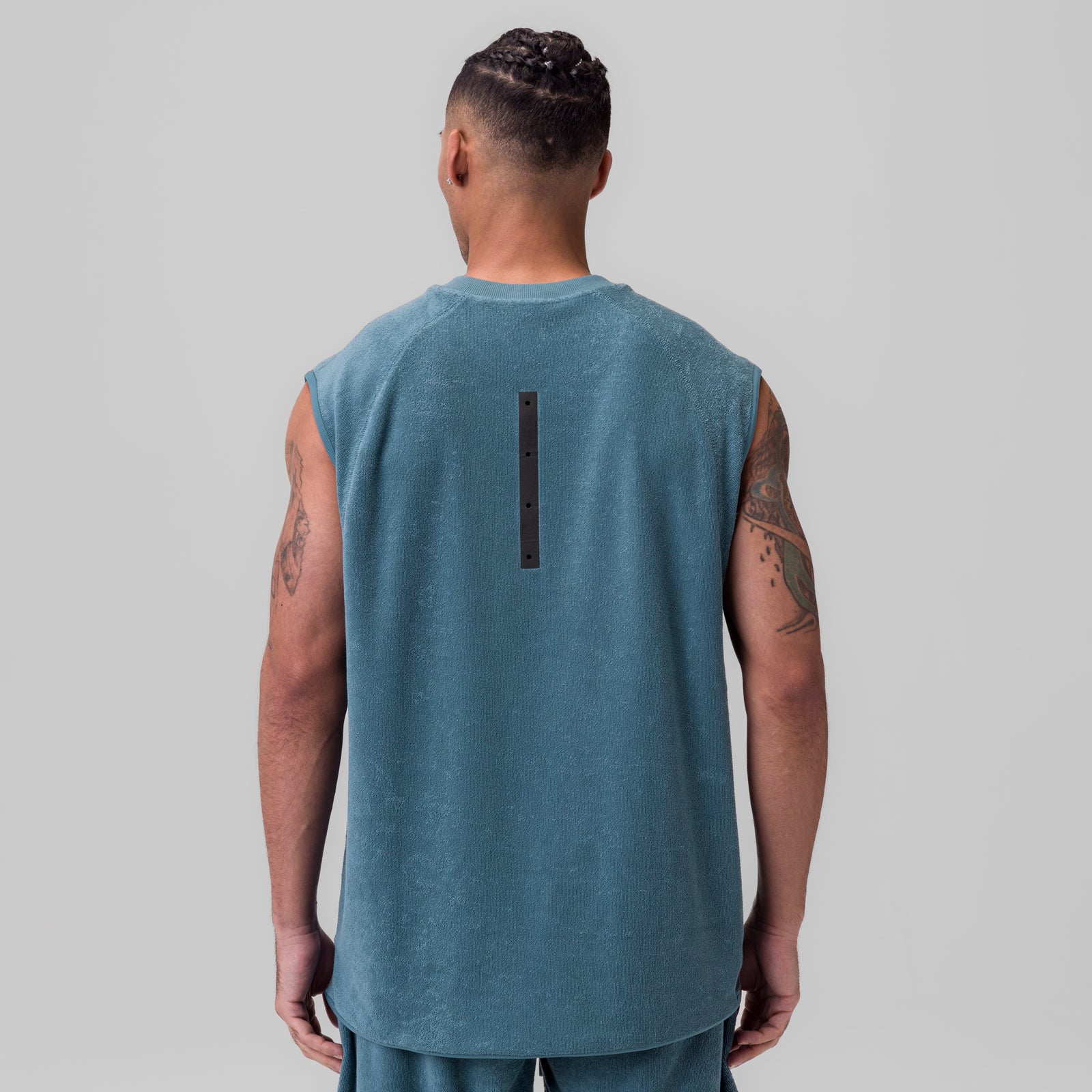 Towel Terry Cutoff sleeveless tank in storm blue, back view on model