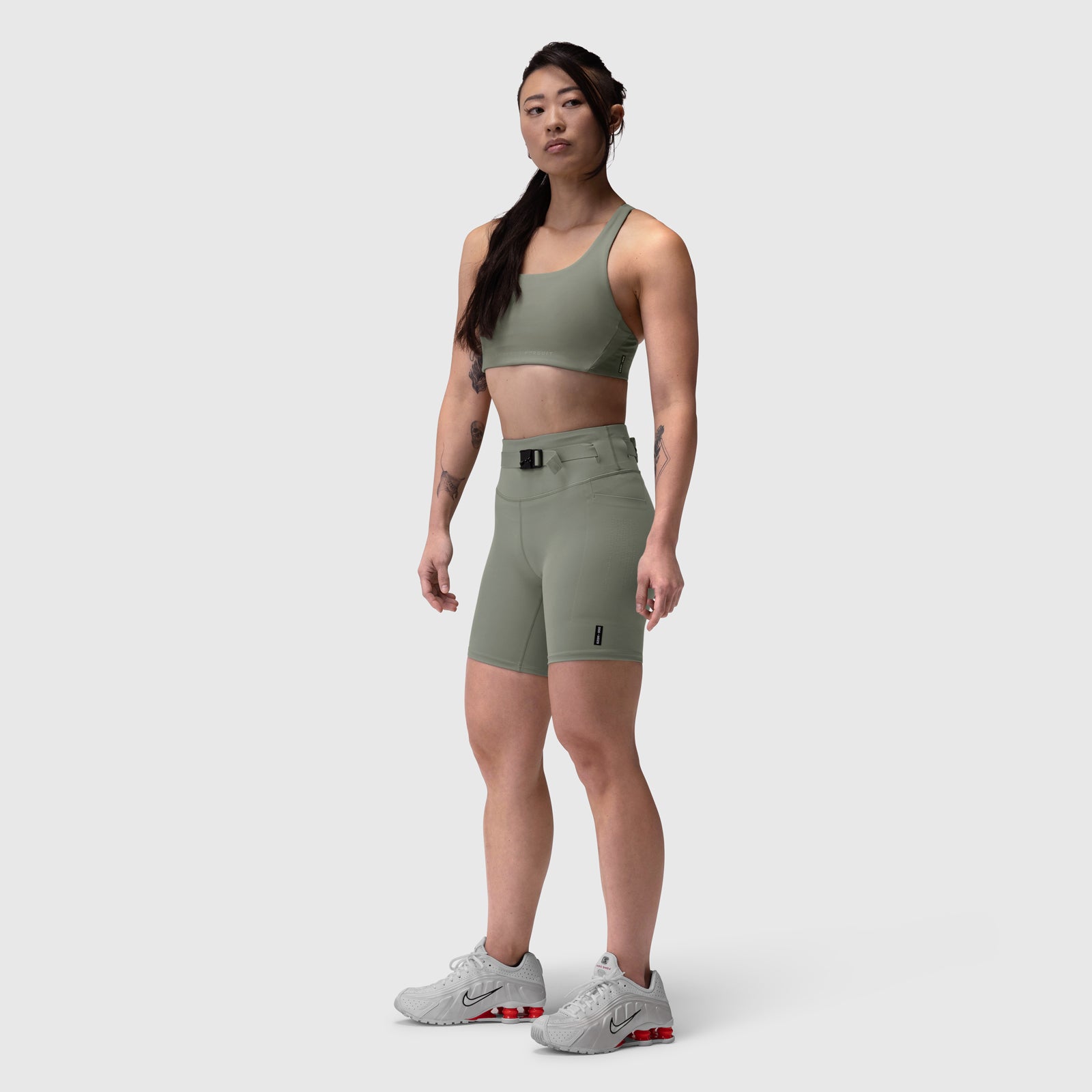 Lycra 3-in-1 Biker Short in sage, worn with matching sports bra, front view