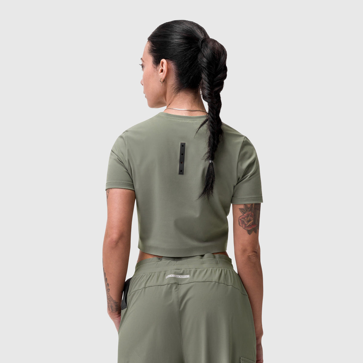 W019 Lycra cropped tee in sage, worn by model shown from back