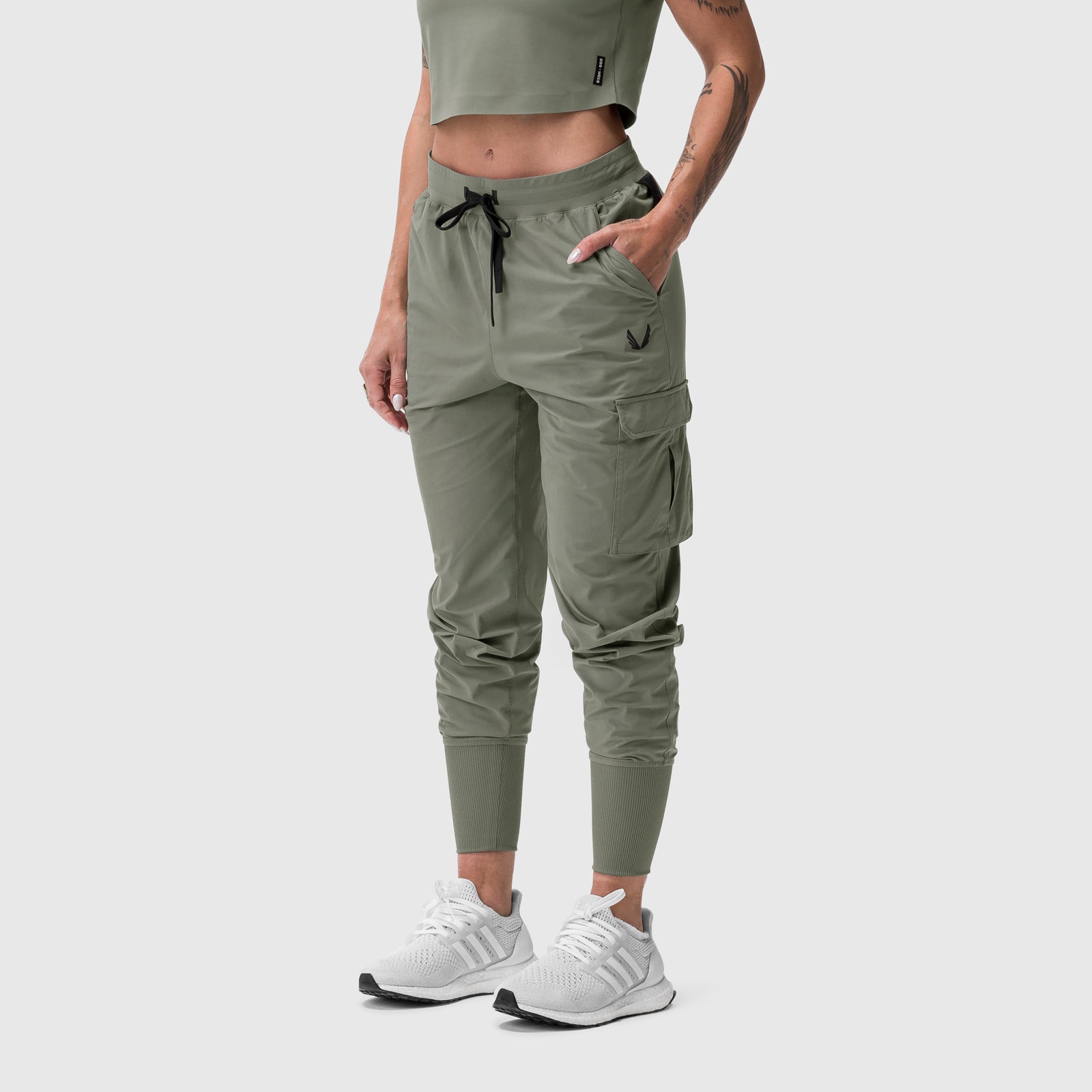 Tetra-Lite Cargo High Rib Jogger in sage, worn with crop top, front view