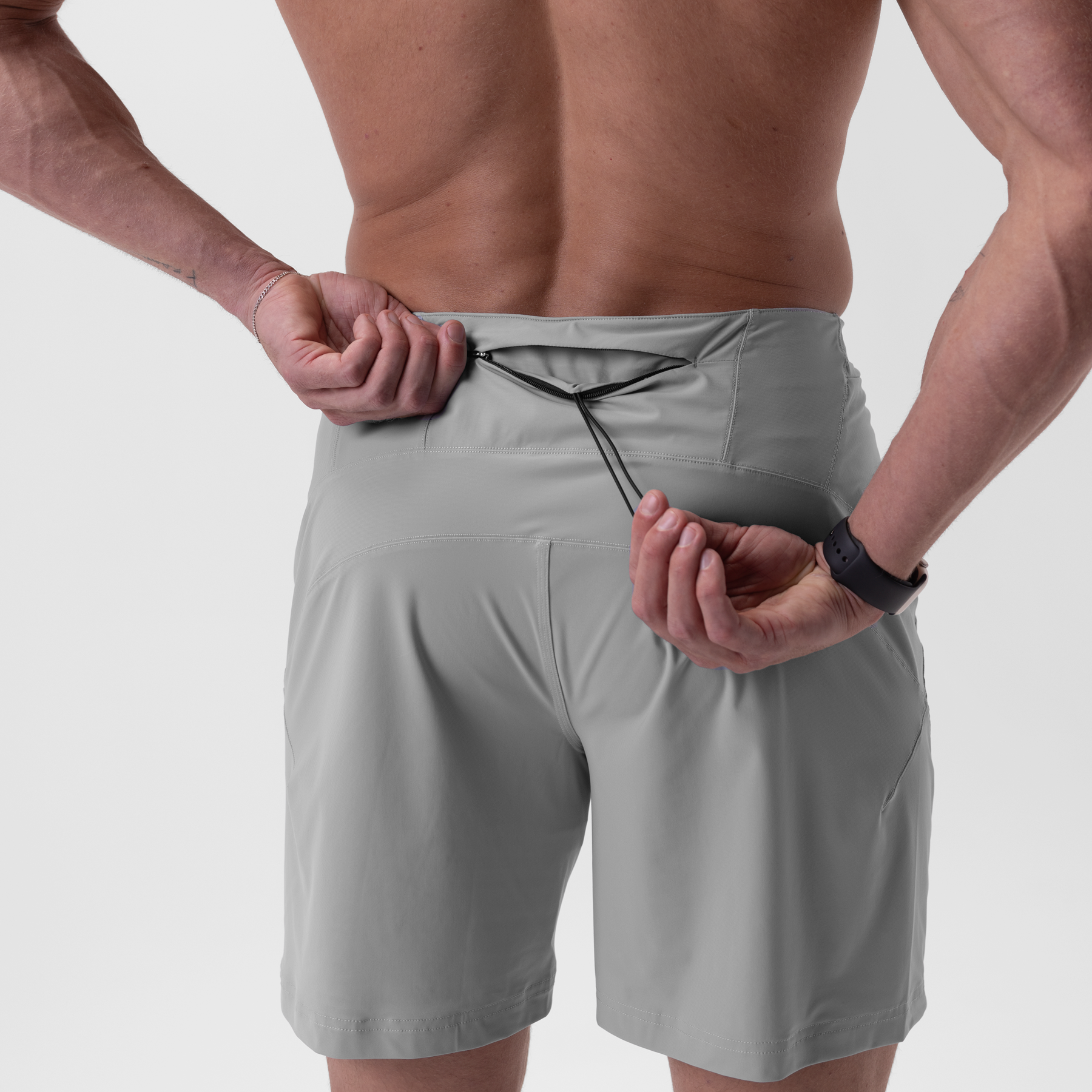 Revolutional Board Short in slate grey, worn by model showing fit and back pocket detail