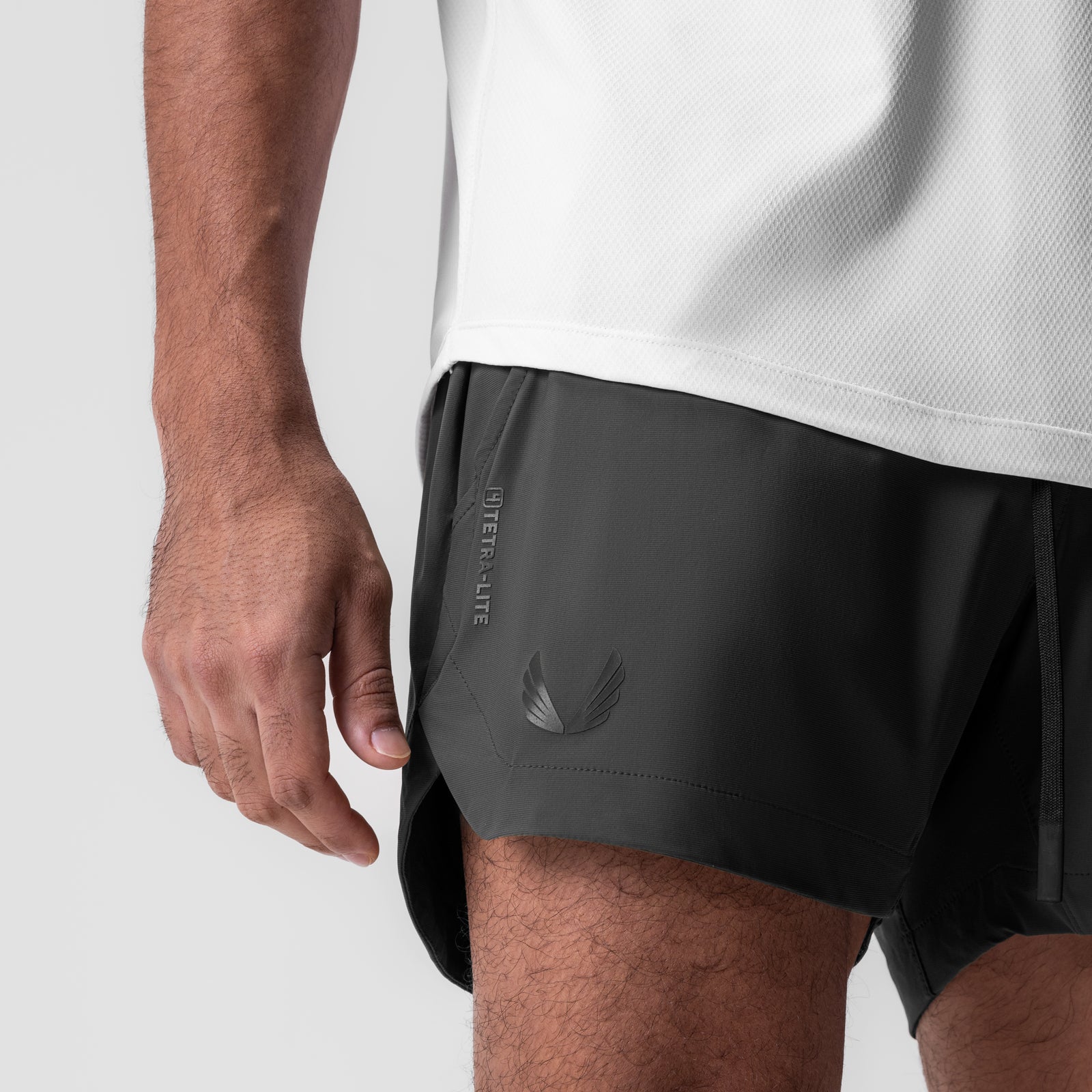 Tetra-Lite 5" Linerless Short in Space Grey, worn by model, side view