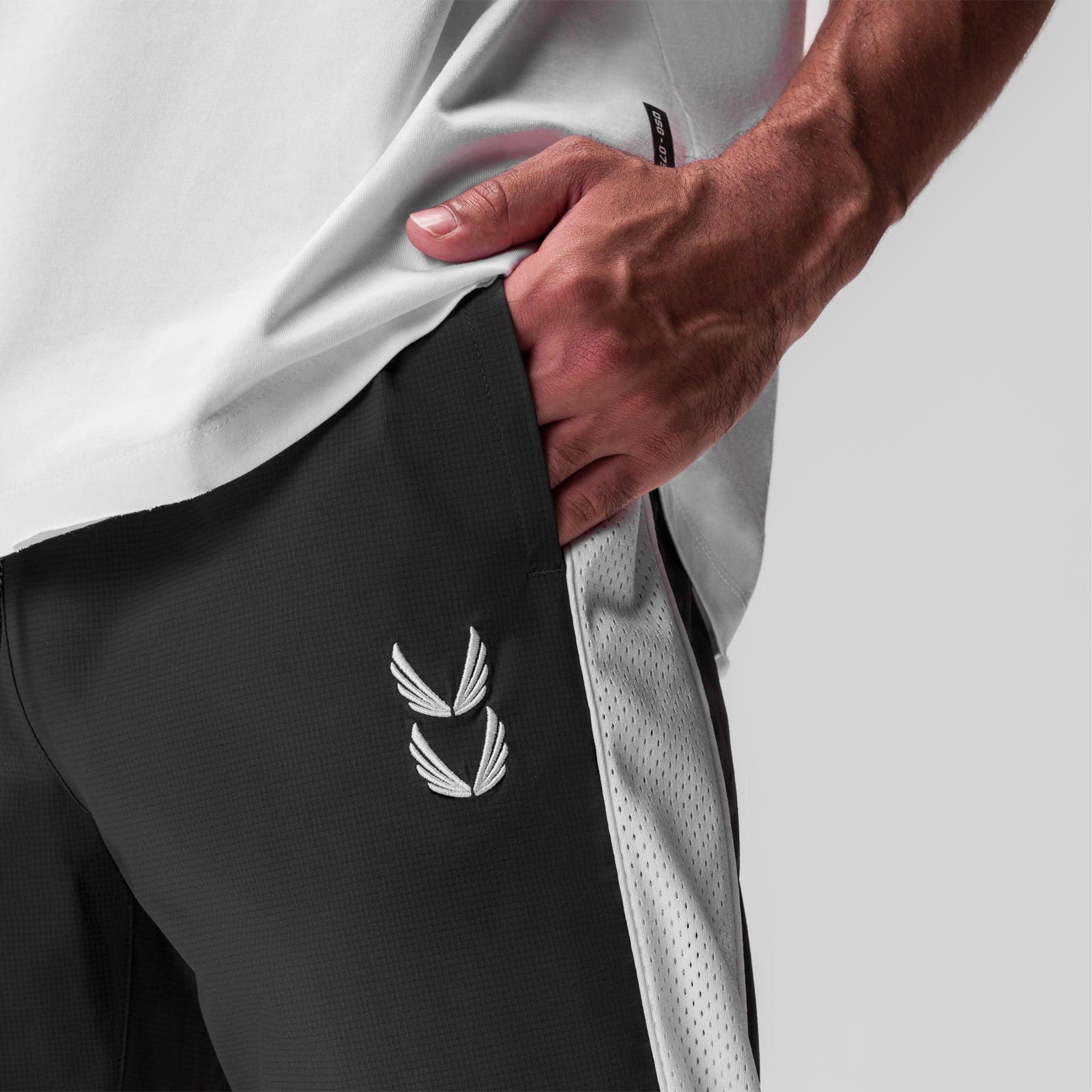 Ripstop Oversized Track Pant in Space Grey, worn by model showing side pocket detail