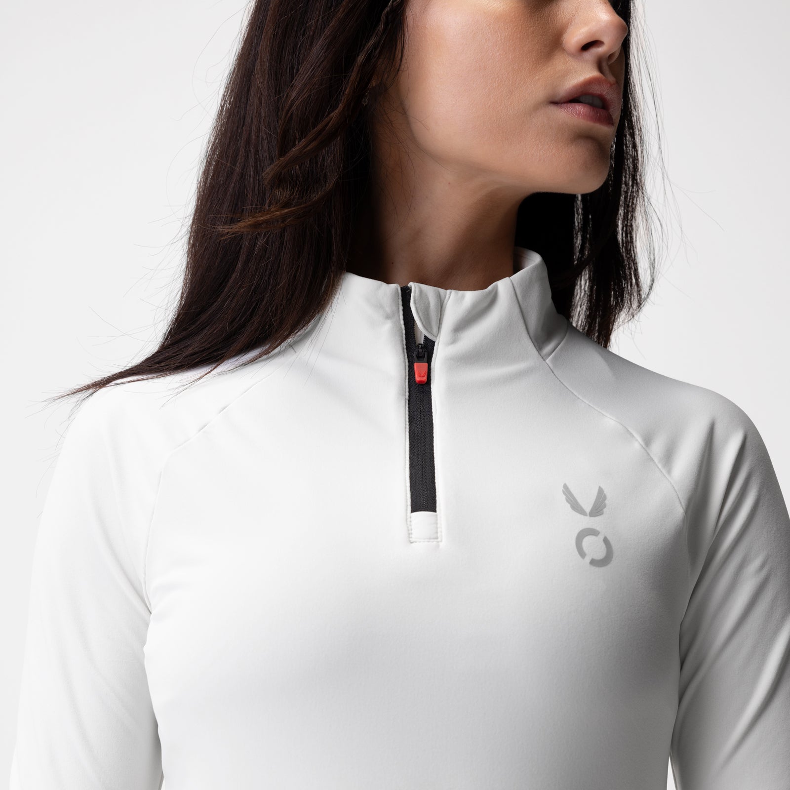 ASRV Performance Quarter Zip in ivory cream, worn by model, front view