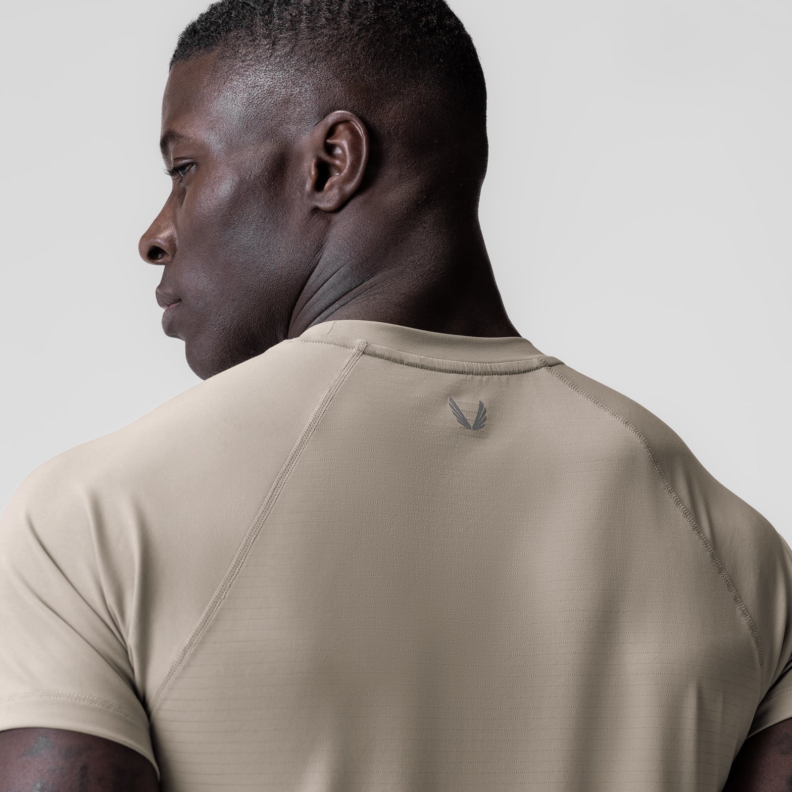 3D-Lite® 2.0 Lycra® Fitted Tee in Sand Smoke, back view on model