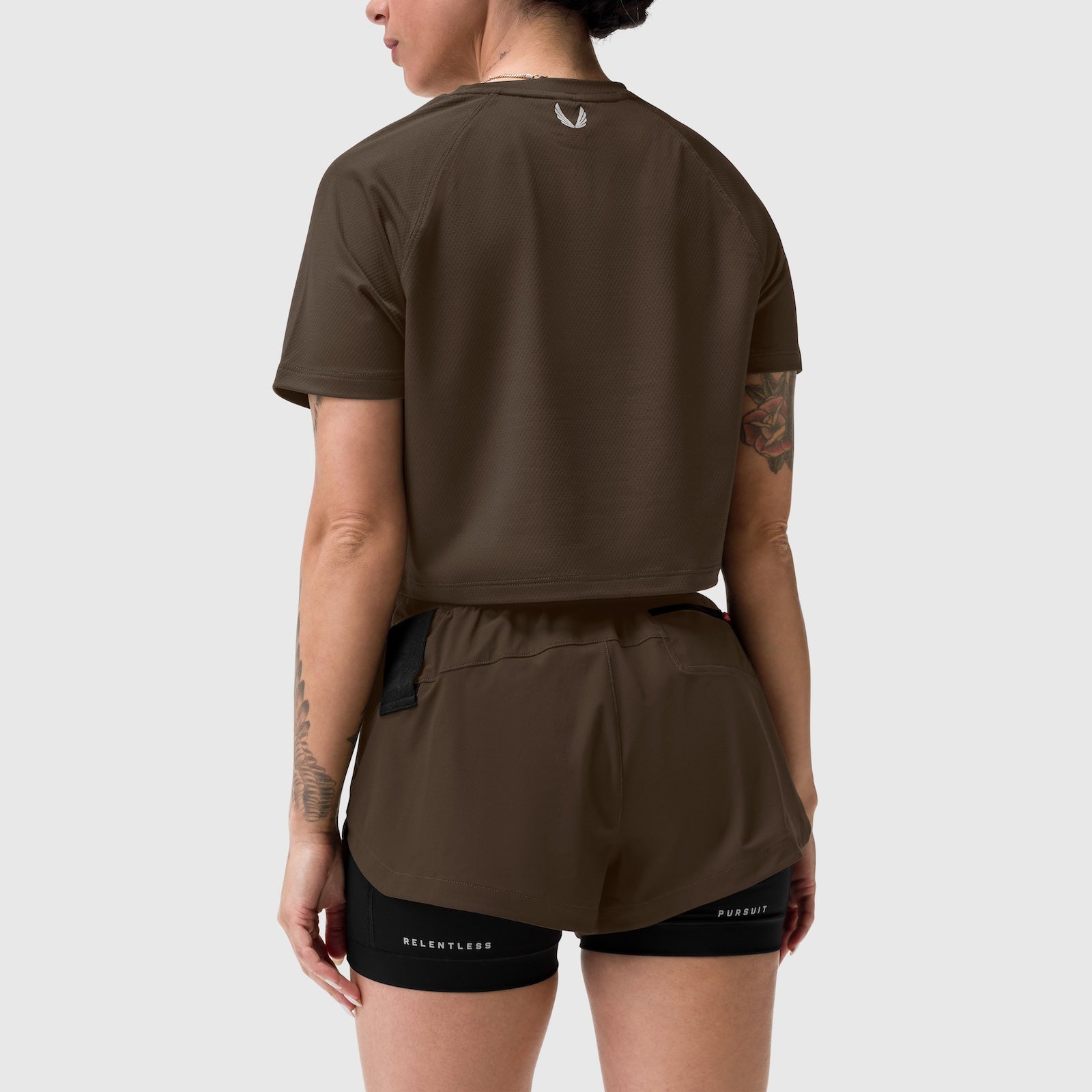 Tetra-Lite® Liner Short in Dark Earth, back view on model