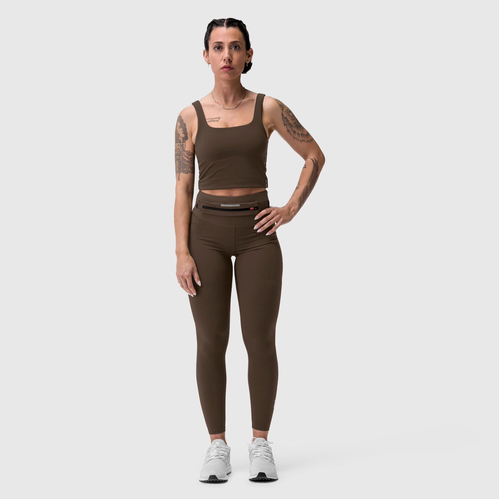 W030 LYCRA® 3-in-1 Legging in Dark Earth, worn by model standing front-facing