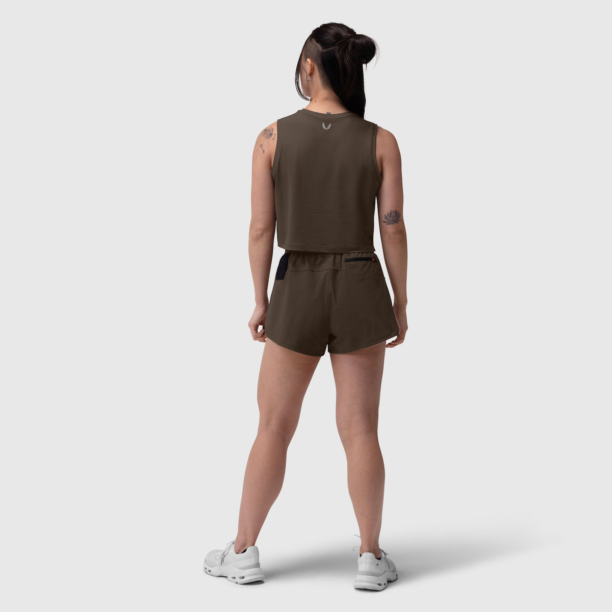 W037. Tetra-Lite® Linerless Short in Dark Earth, rear view on model