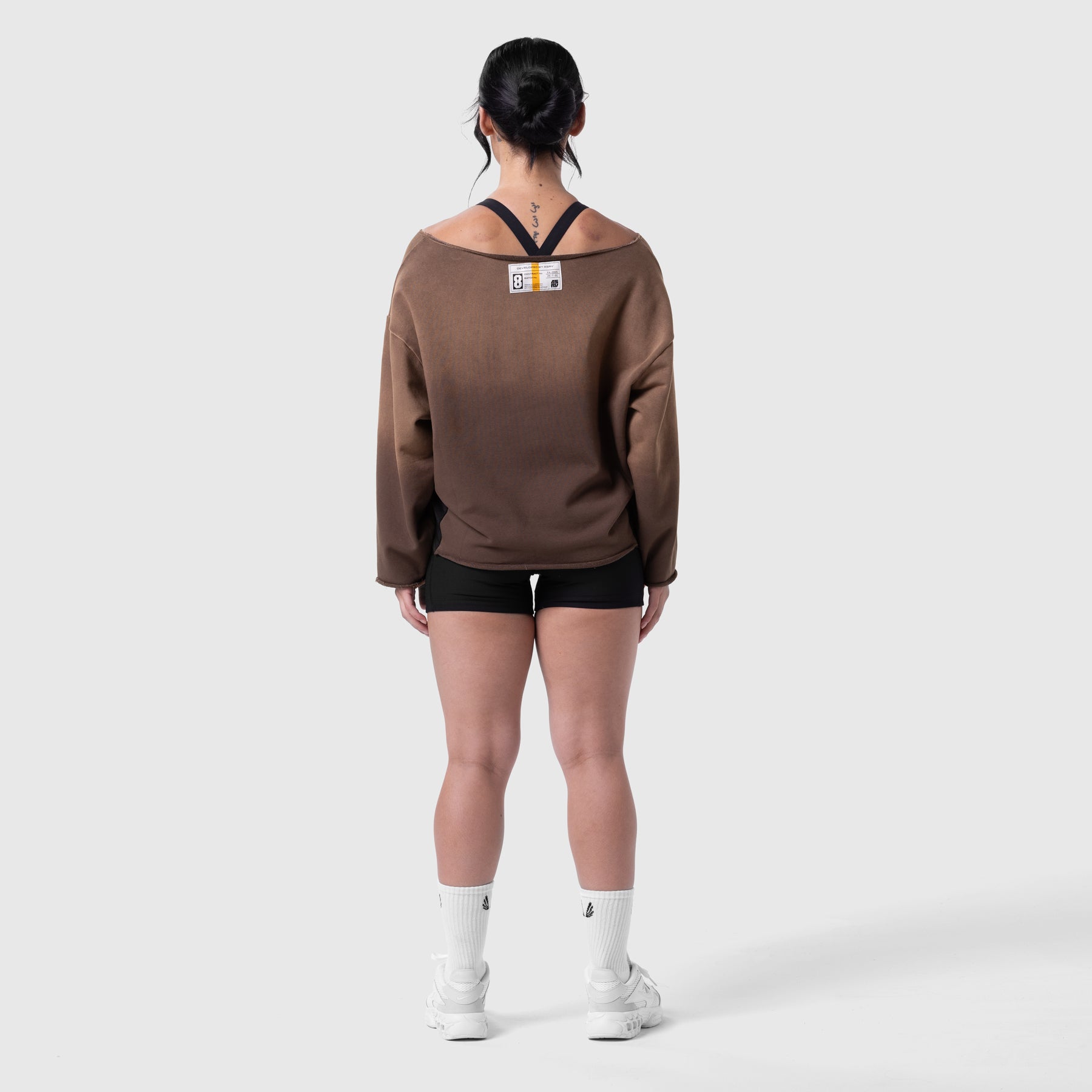 Raw Hem Oversized Crewneck in dark earth worn by model, back view