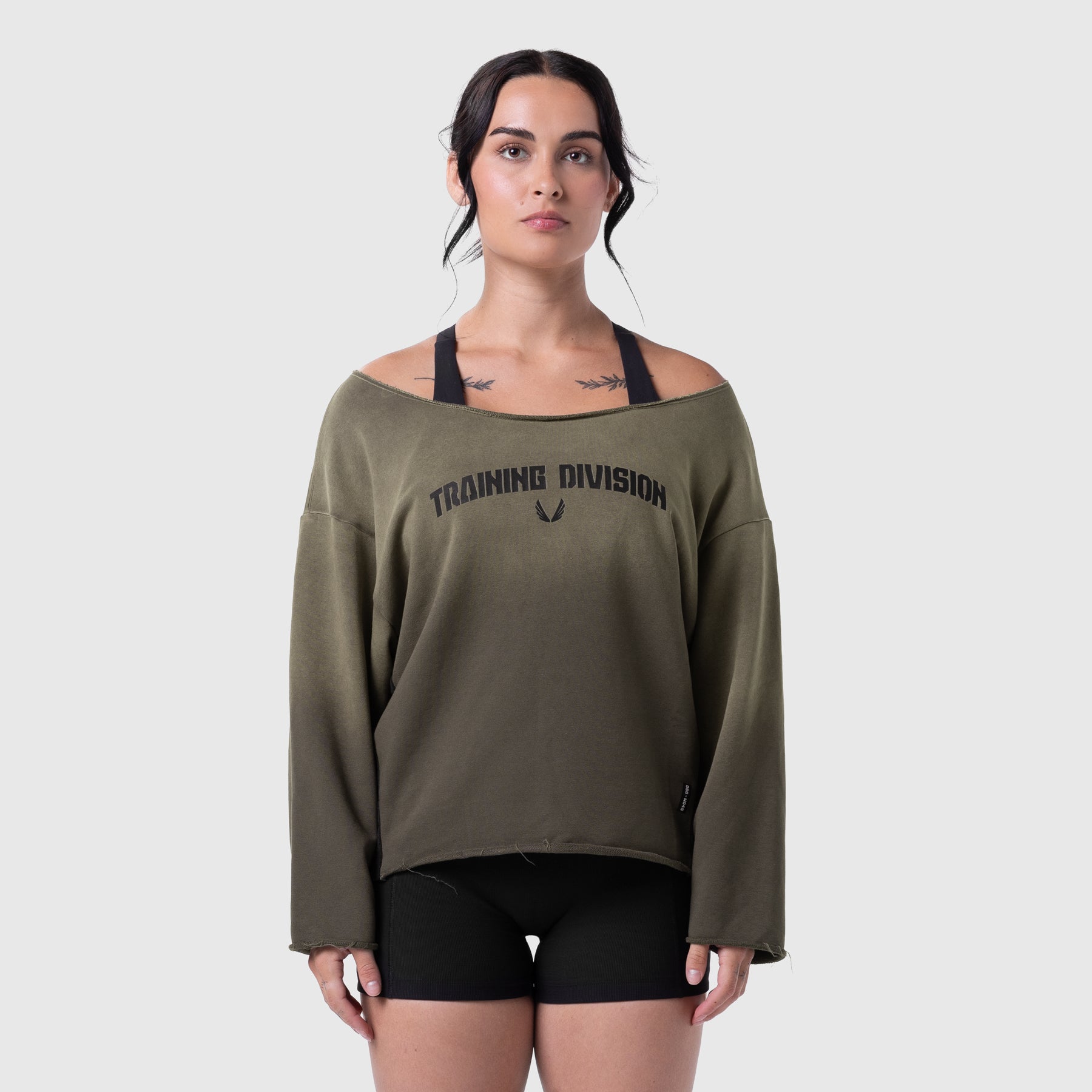 Raw Hem Oversized Crewneck in olive worn by model with black straps, front view