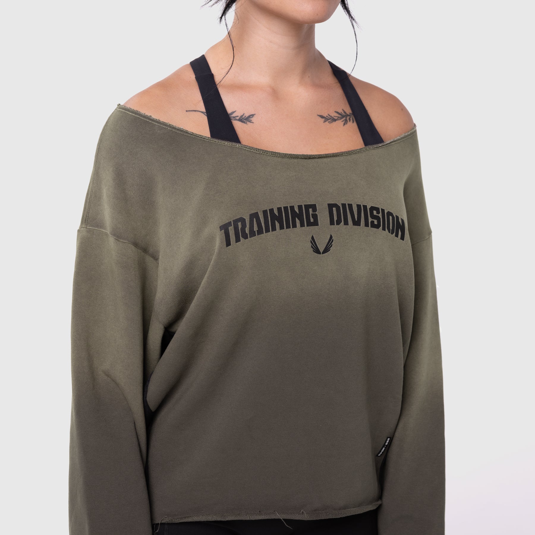 Raw Hem Oversized Crewneck in olive sun fade worn by model, front view