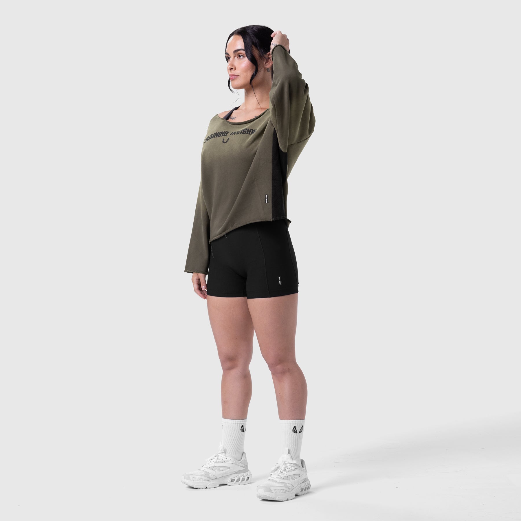 Raw Hem Oversized Crewneck in olive with black shorts, modeled with white sneakers and white socks