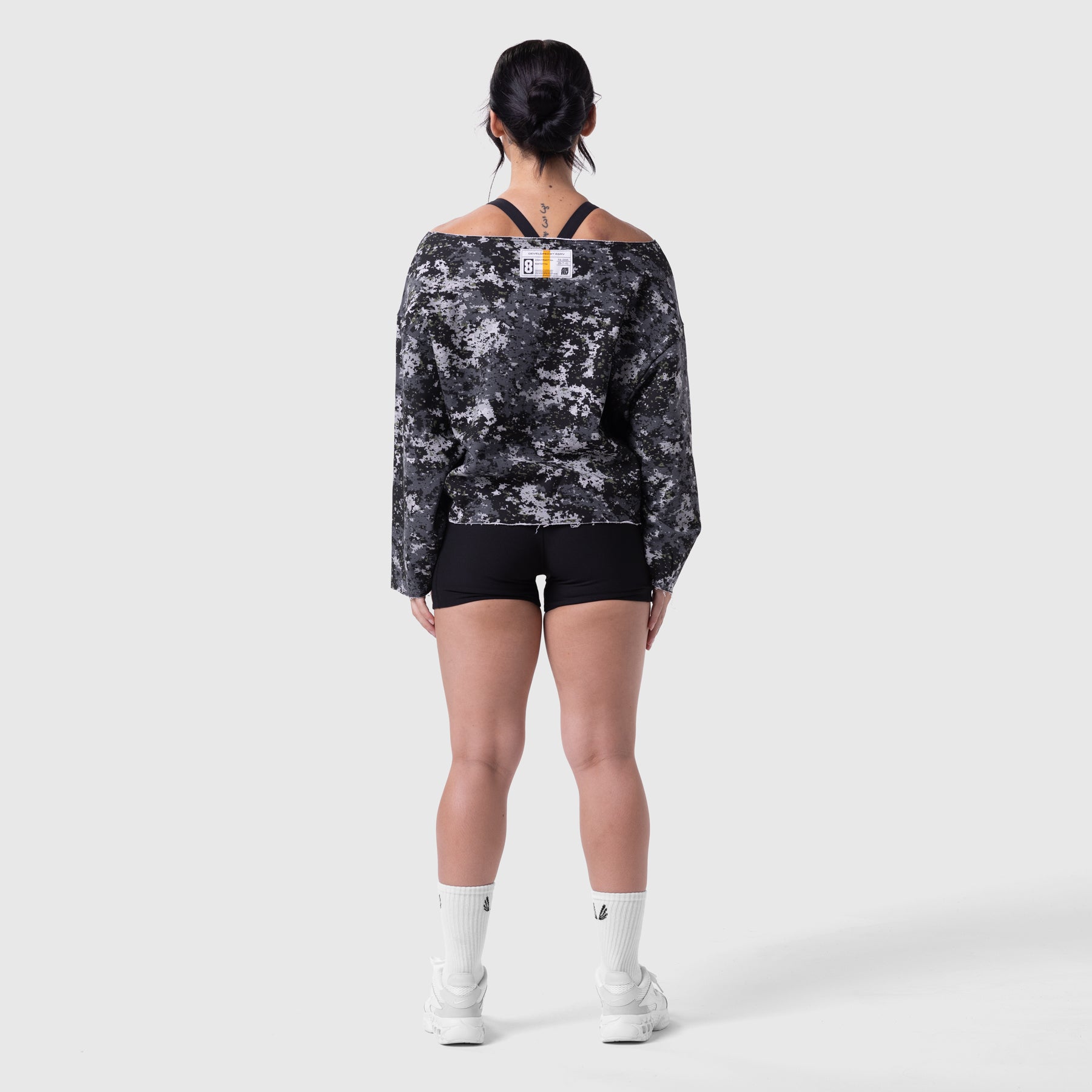 W049 Raw Hem Oversized Crewneck in pixel camo worn by model, back view