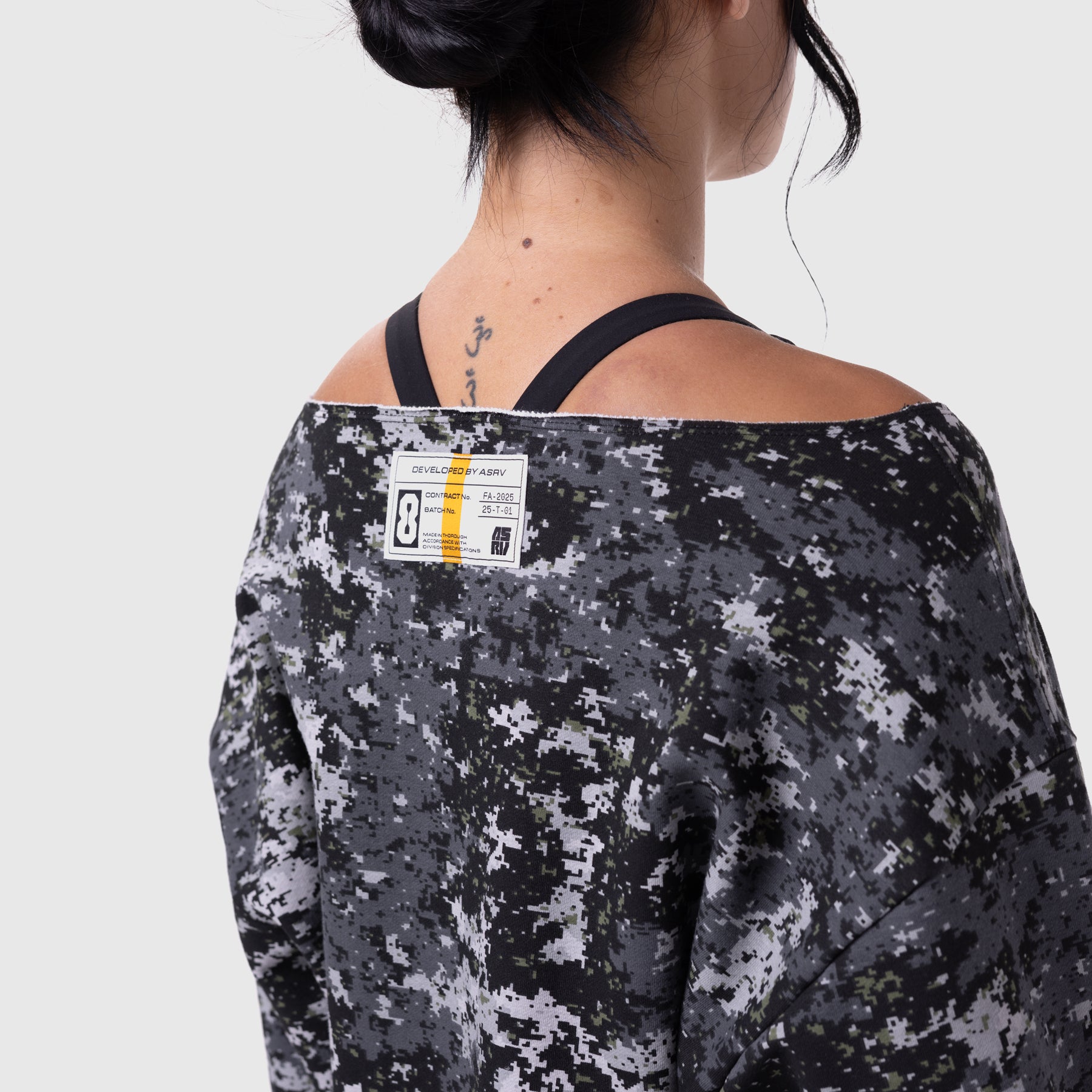 Raw Hem Oversized Crewneck in pixel camo worn by model, back view