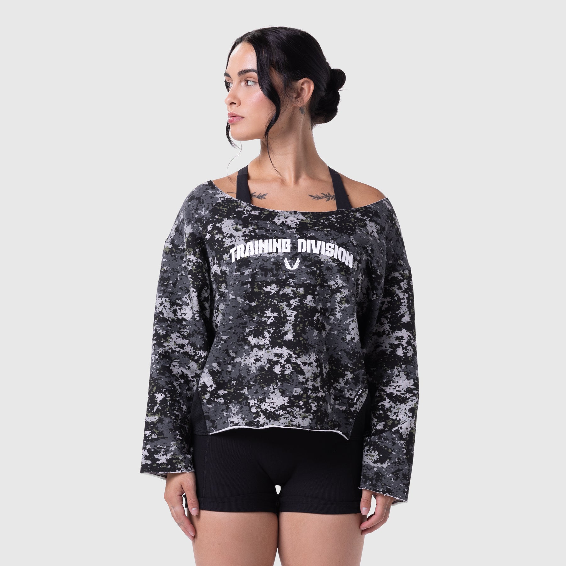 Raw Hem Oversized Crewneck in pixel camo worn by model, front view