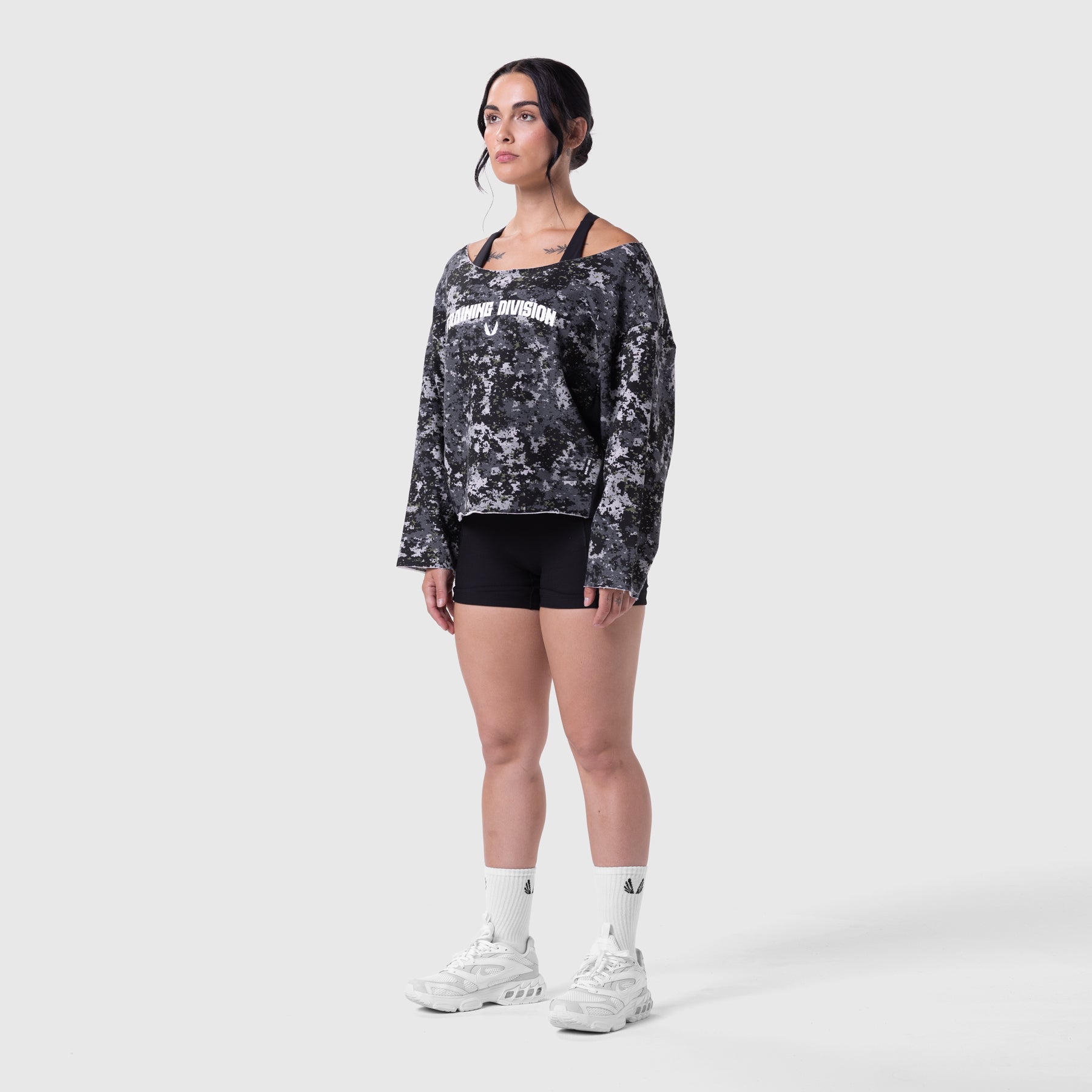 Raw Hem Oversized Crewneck in pixel camo worn with black shorts and white sneakers