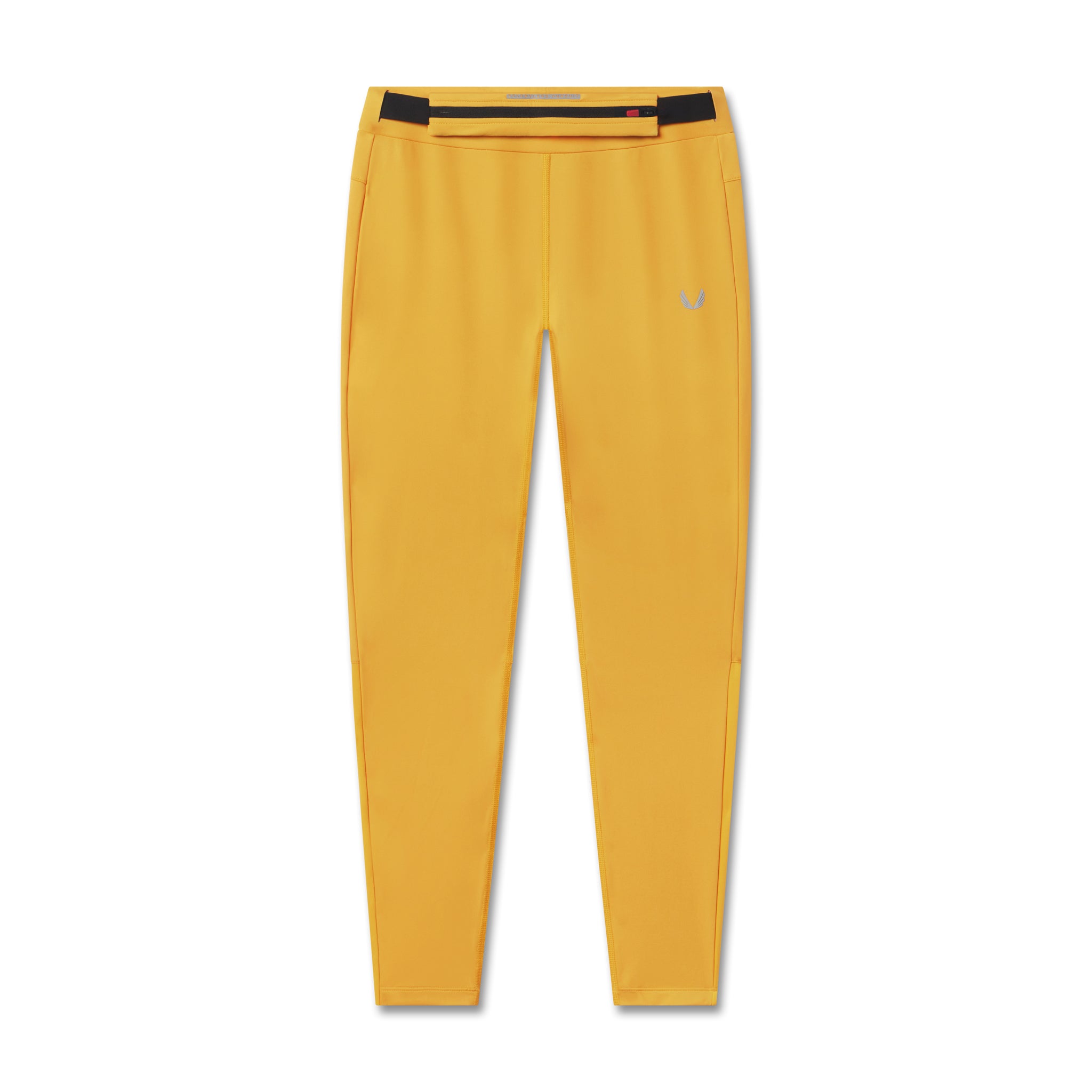 flatlay Hybrid Belt-Pack Run Legging in amber yellow, front view