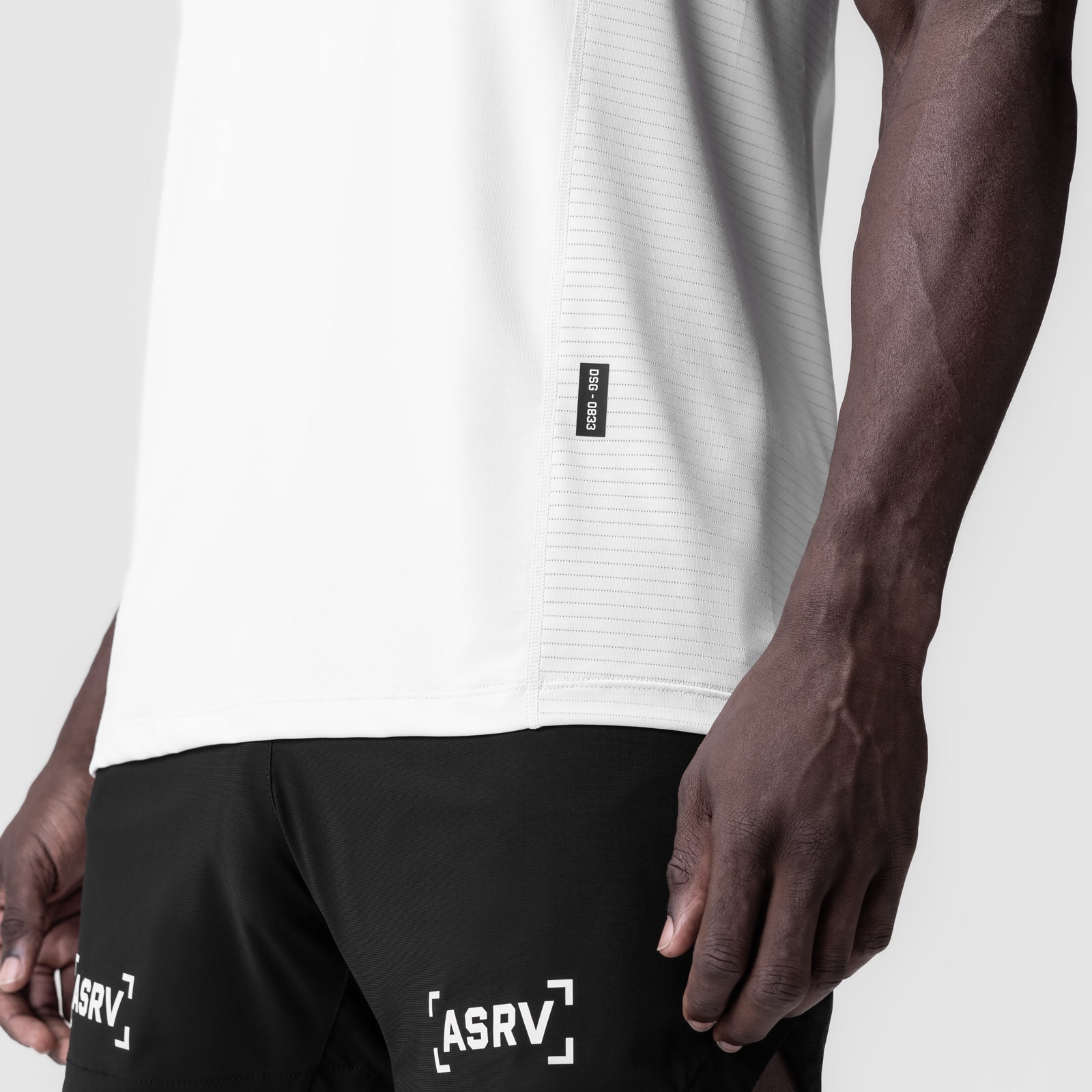 White 3D-Lite® 2.0 Lycra® Pro Singlet worn by model, side view detail