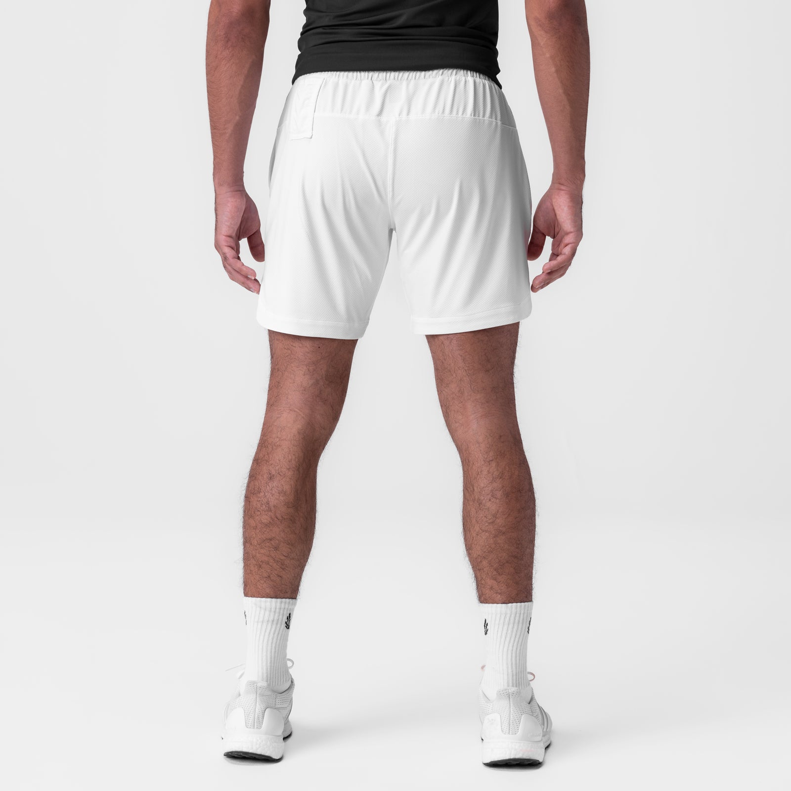 AeroSilver 7" Linerless Short in white, back view on model