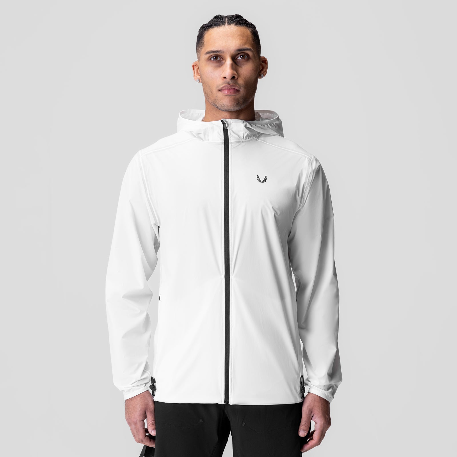 Aerotex™ Lightweight Windbreaker in white, worn by model, front view with hood