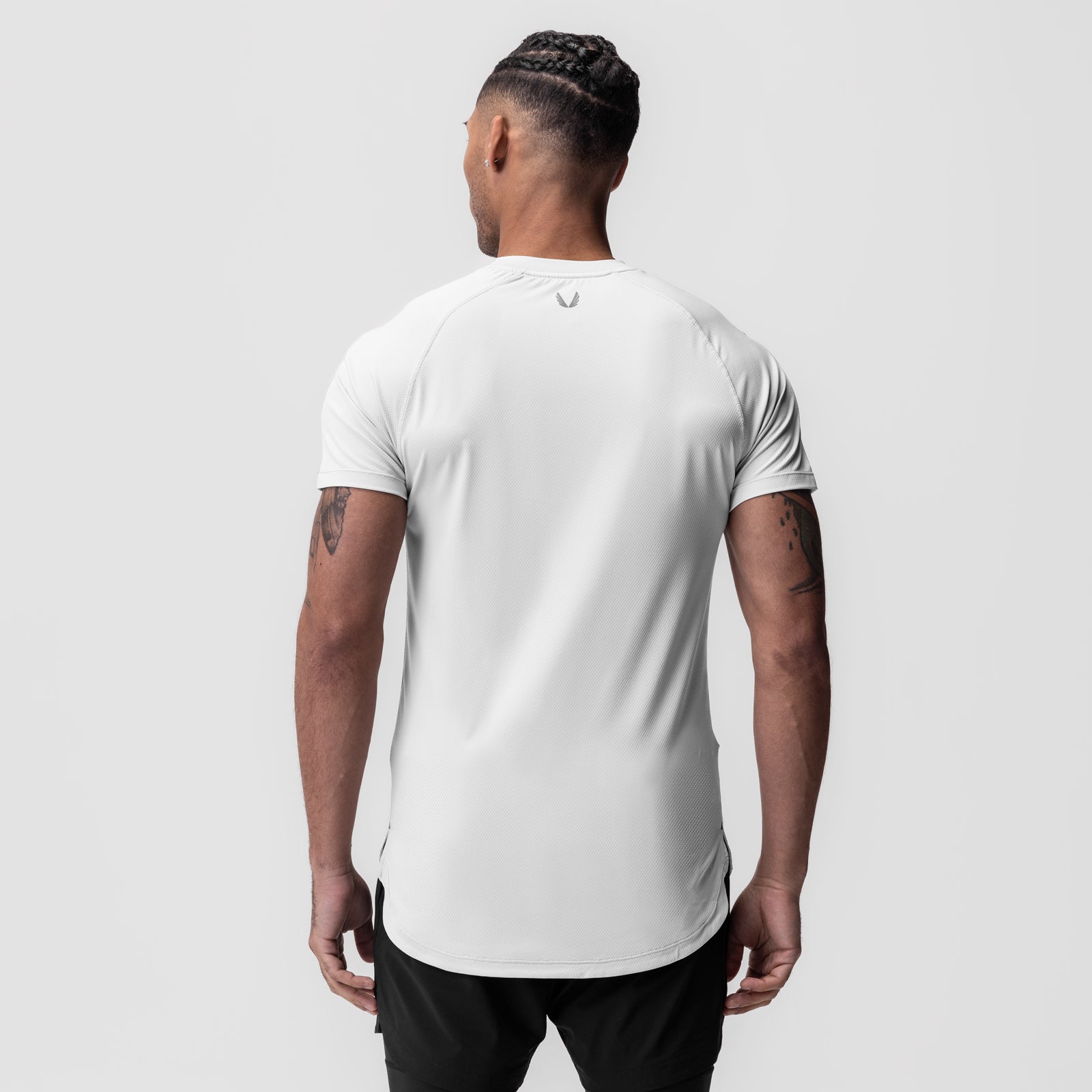 White AeroSilver Established Tee worn by model, back view