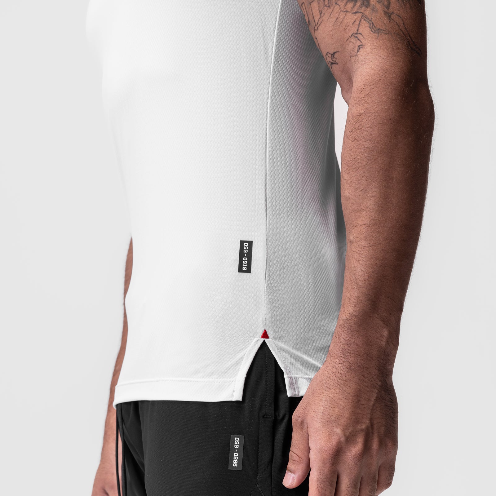 AeroSilver Fitted Tee in white, worn by model showing side profile and fit