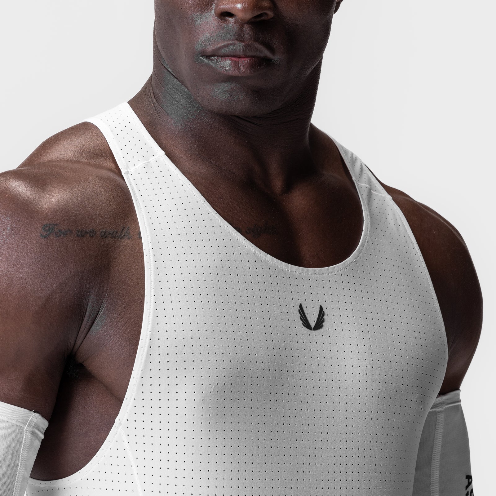 Laser-Vent™ Singlet Tank in white, worn by male model, front view