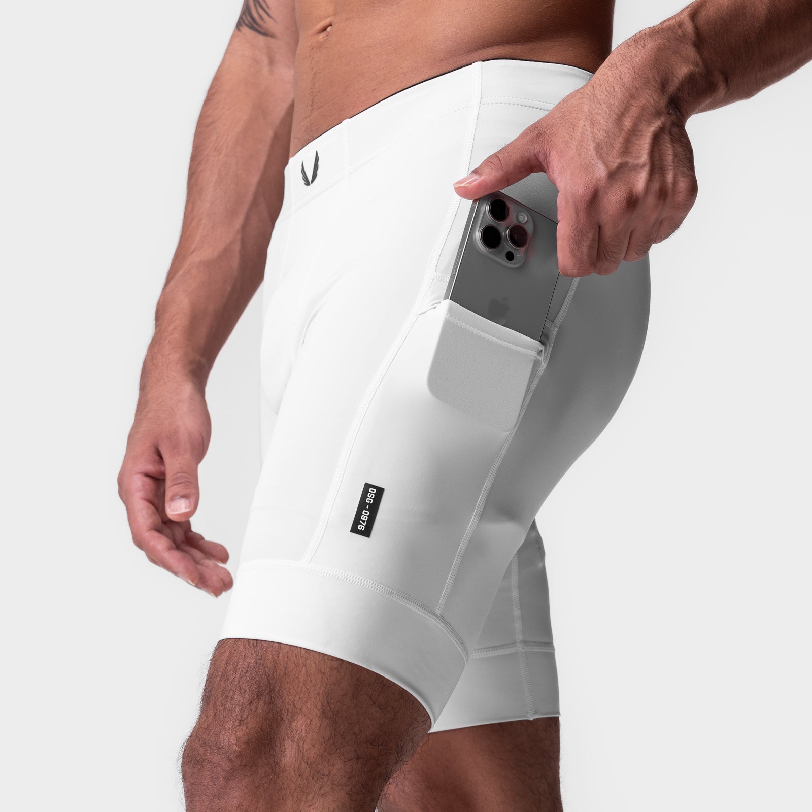 WarpFlexx-Lite 1/2-Length Legging in white, model wearing with phone in pocket