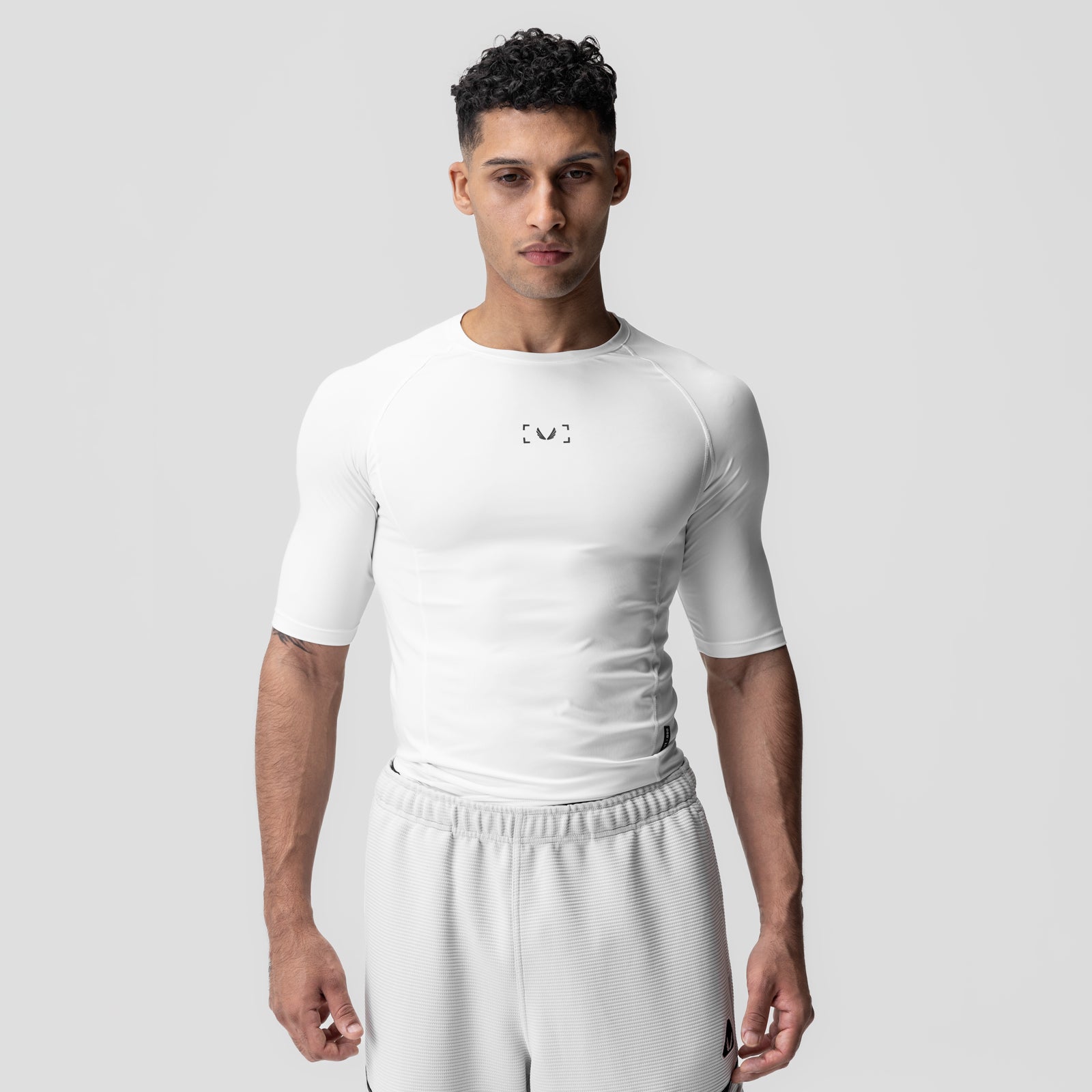 WarpFlexx-Lite® half-sleeve baselayer in white, worn by model, front view
