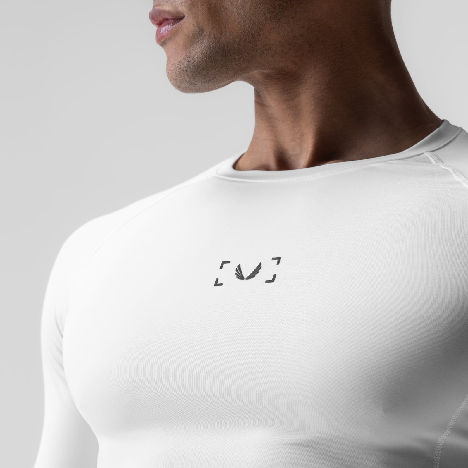 WarpFlexx-Lite half-sleeve baselayer in white, worn by model, front view