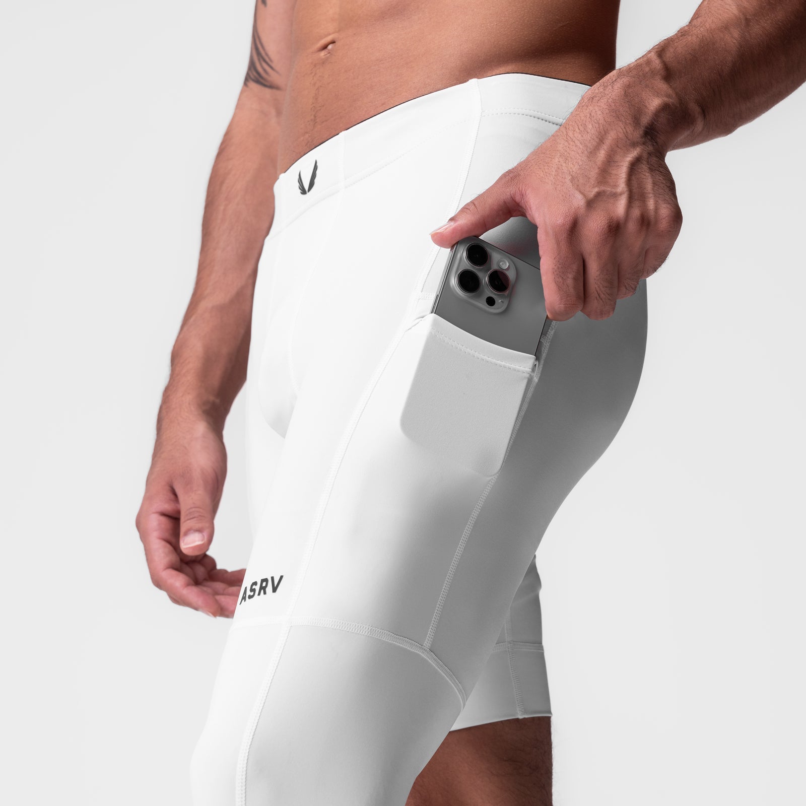 WarpFlexx-Lite Single Legging in white, model wearing shorts with phone in pocket