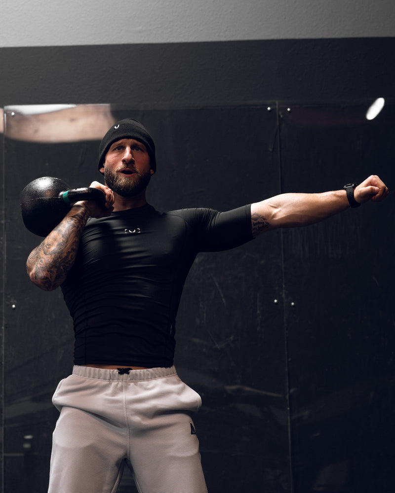 1027. WarpFlexx-Lite® Half-Sleeve Baselayer - Black