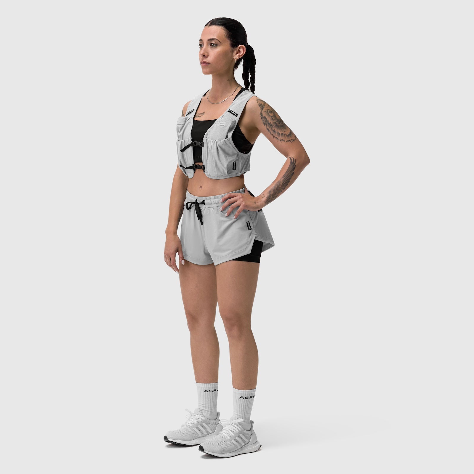 W025 Tetra-Lite Liner Short in slate grey, modeled with matching vest and white socks