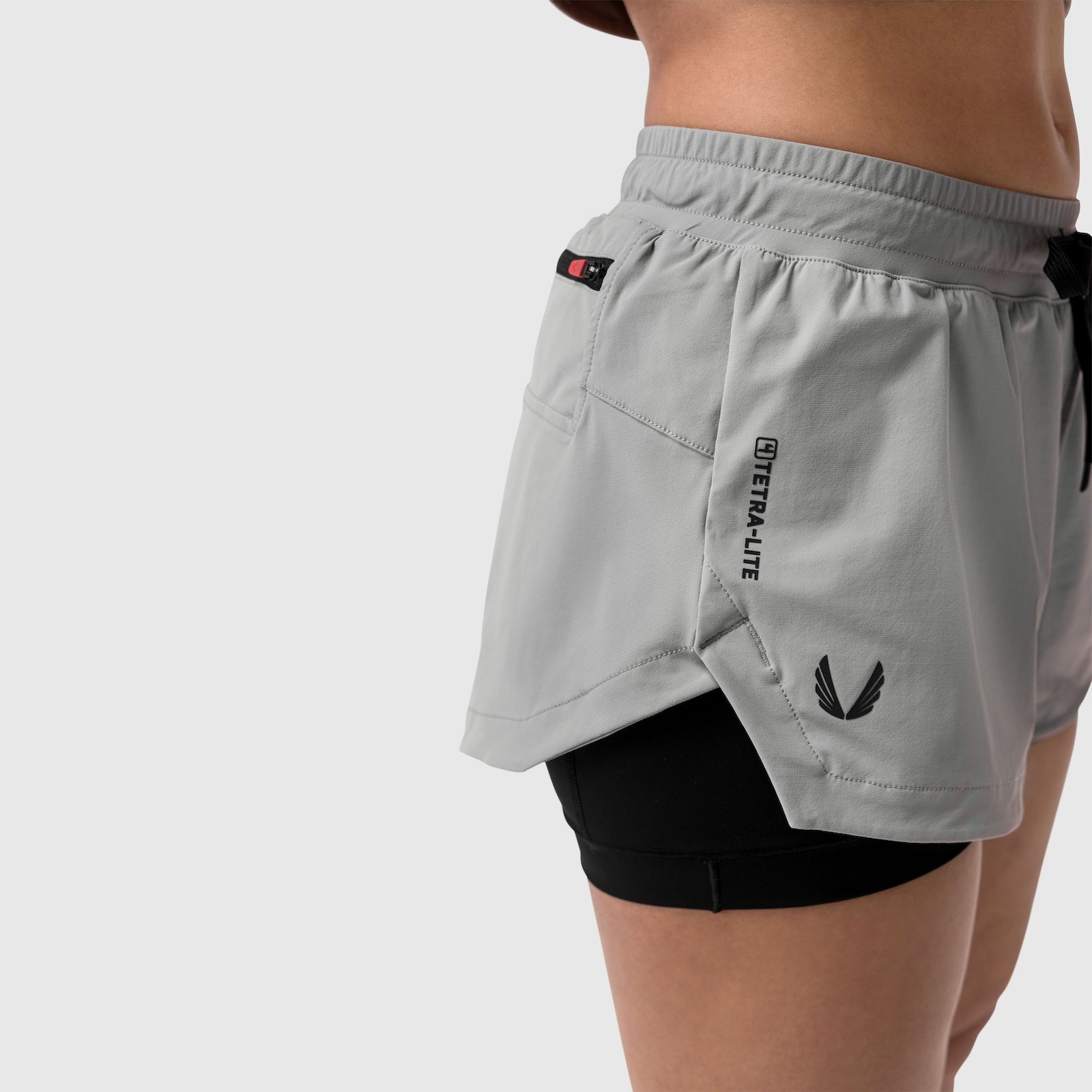 Tetra-Lite Liner Short in slate grey worn with black undershorts, side view