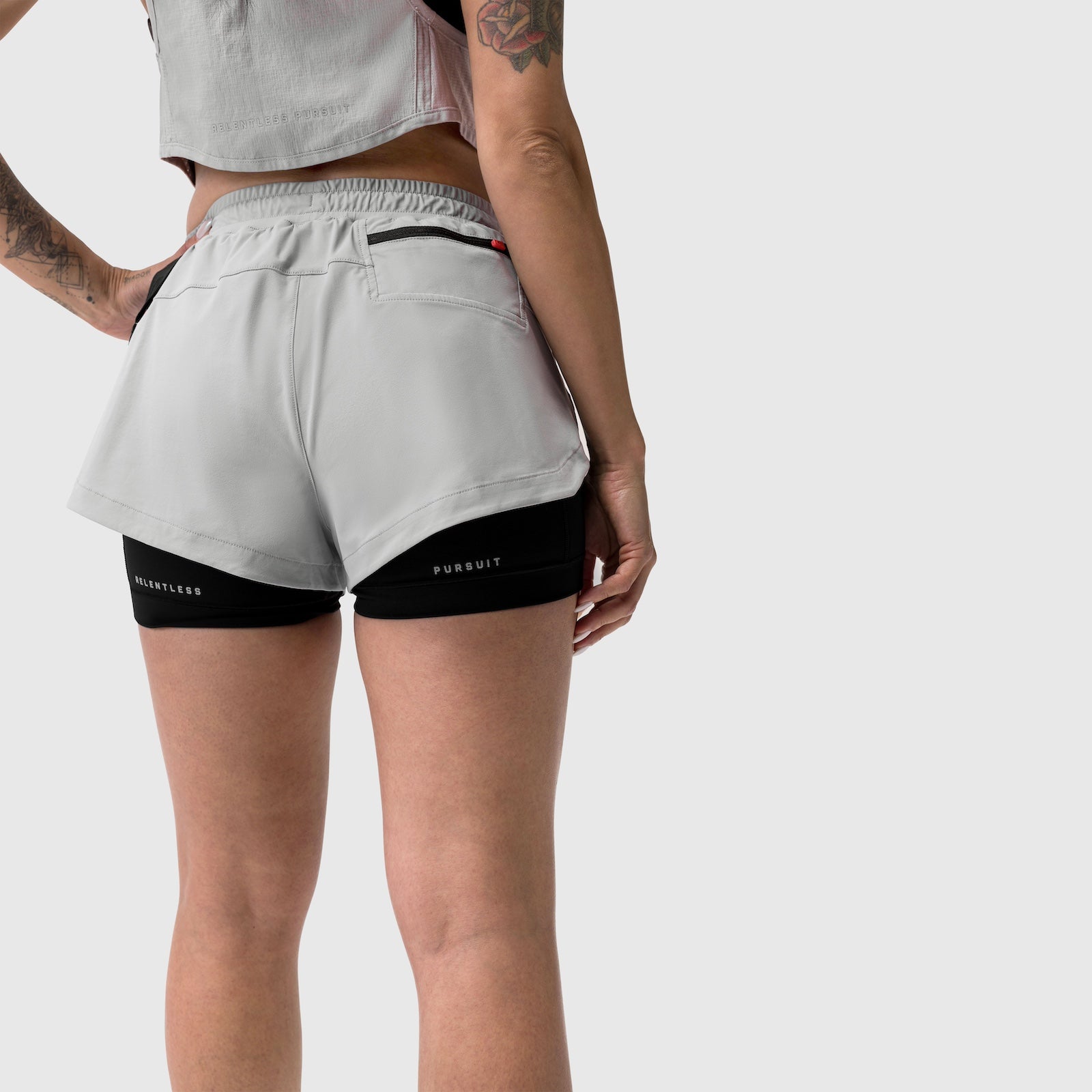 Tetra-Lite Liner Short in slate grey and black, back view on model