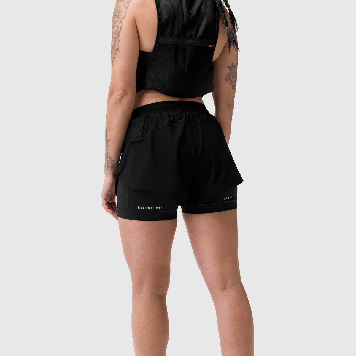 Tetra-Lite Liner Short in black, worn by model shown from back