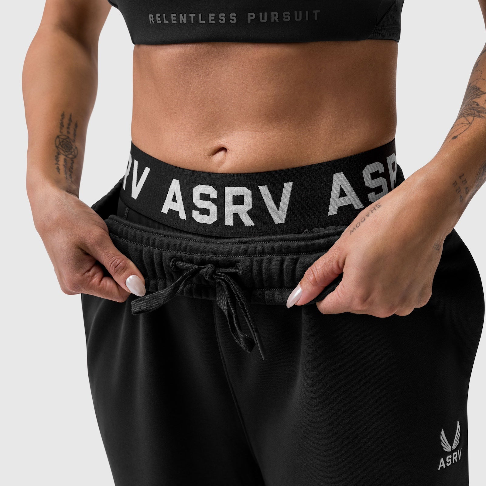Black Sorona Terry Straight Leg Sweats worn by model, waist-down view showing drawstring detail